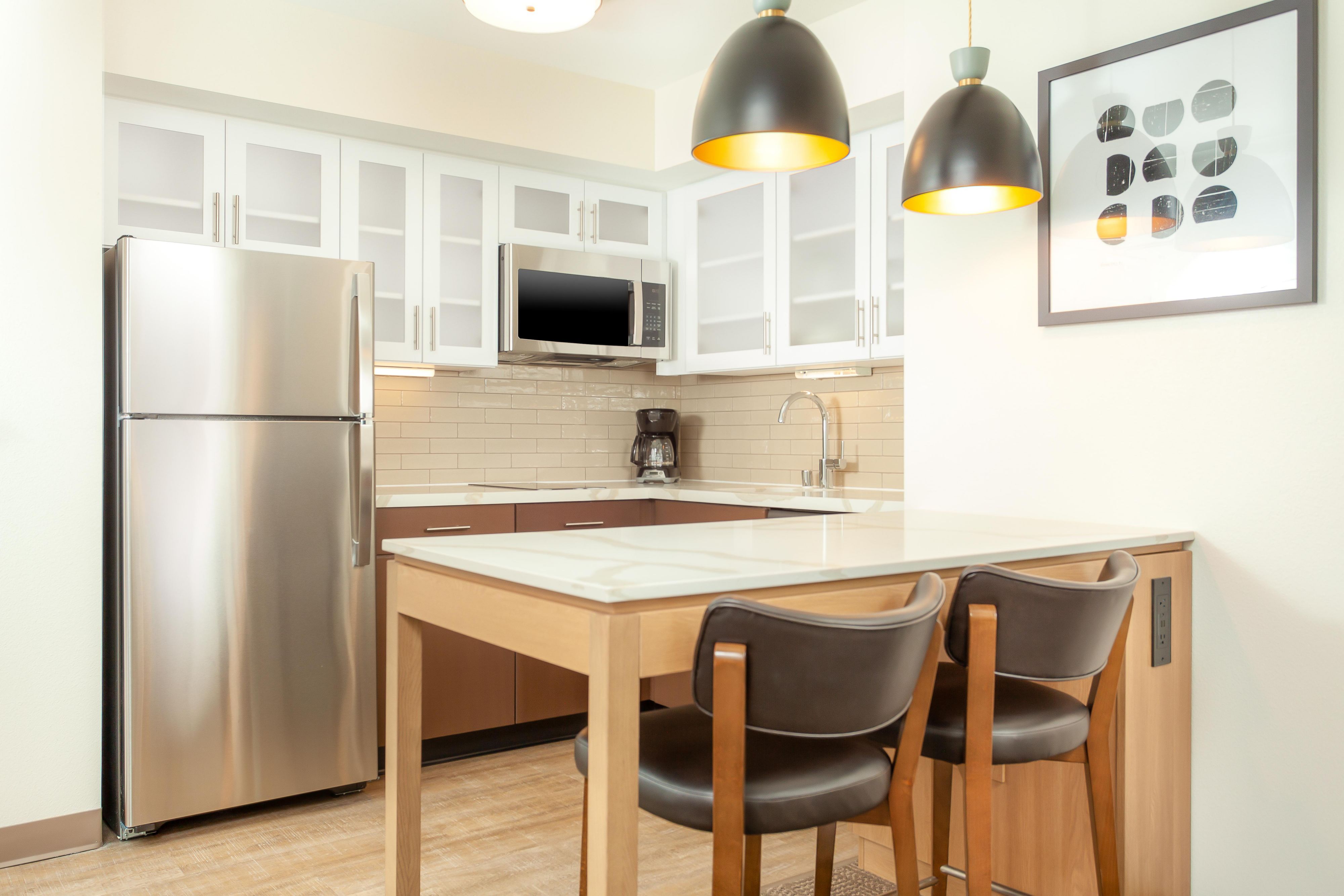 Flexibility to cook what you want, when you want with a cooktop stove, microwave, full refrigerator, 
garbage disposal, coffee maker, toaster and complete with linens and utensils