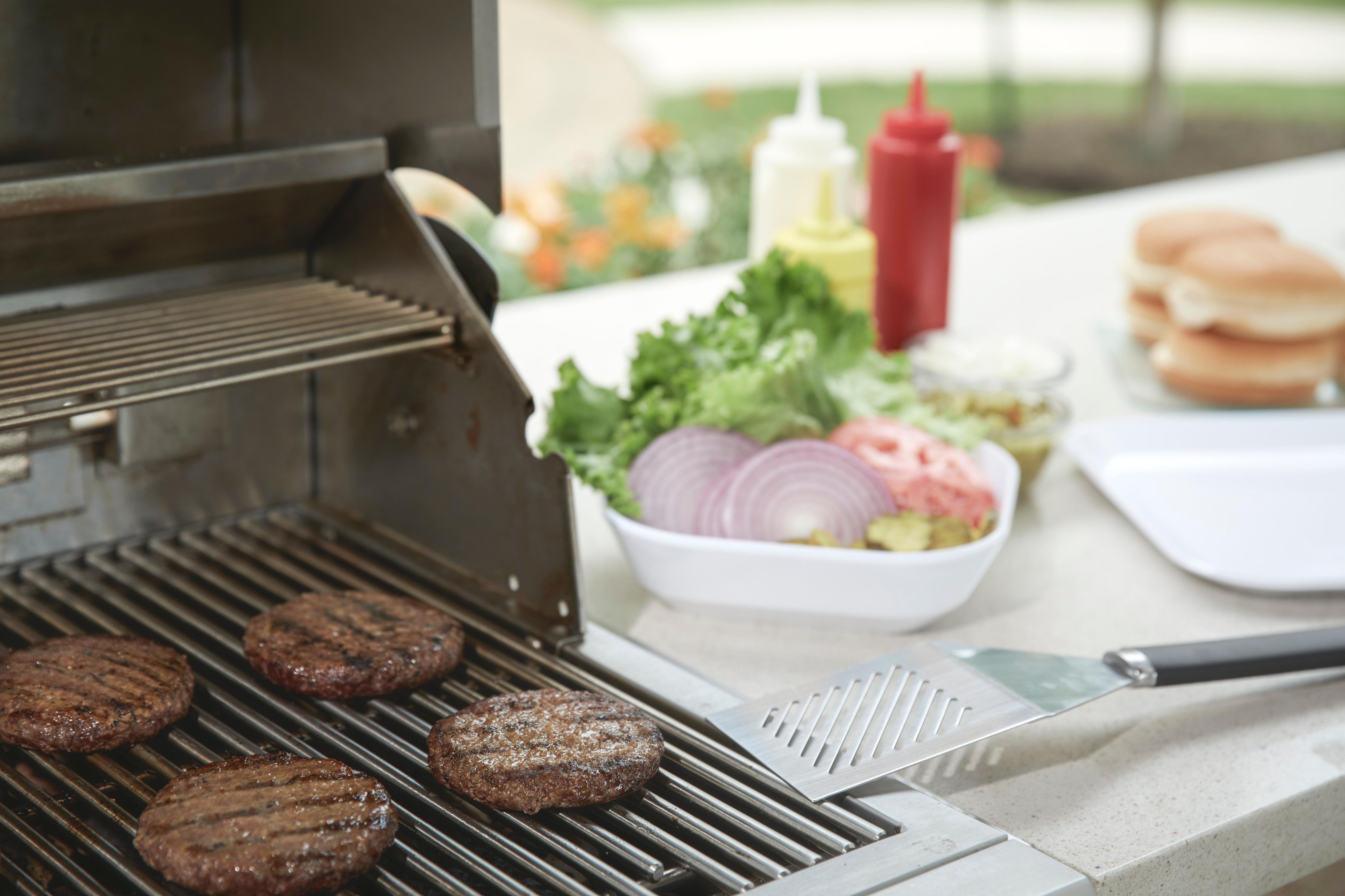 Visit our outdoor living area where you can grill a meal, gather around the fire pit, and unwind. 