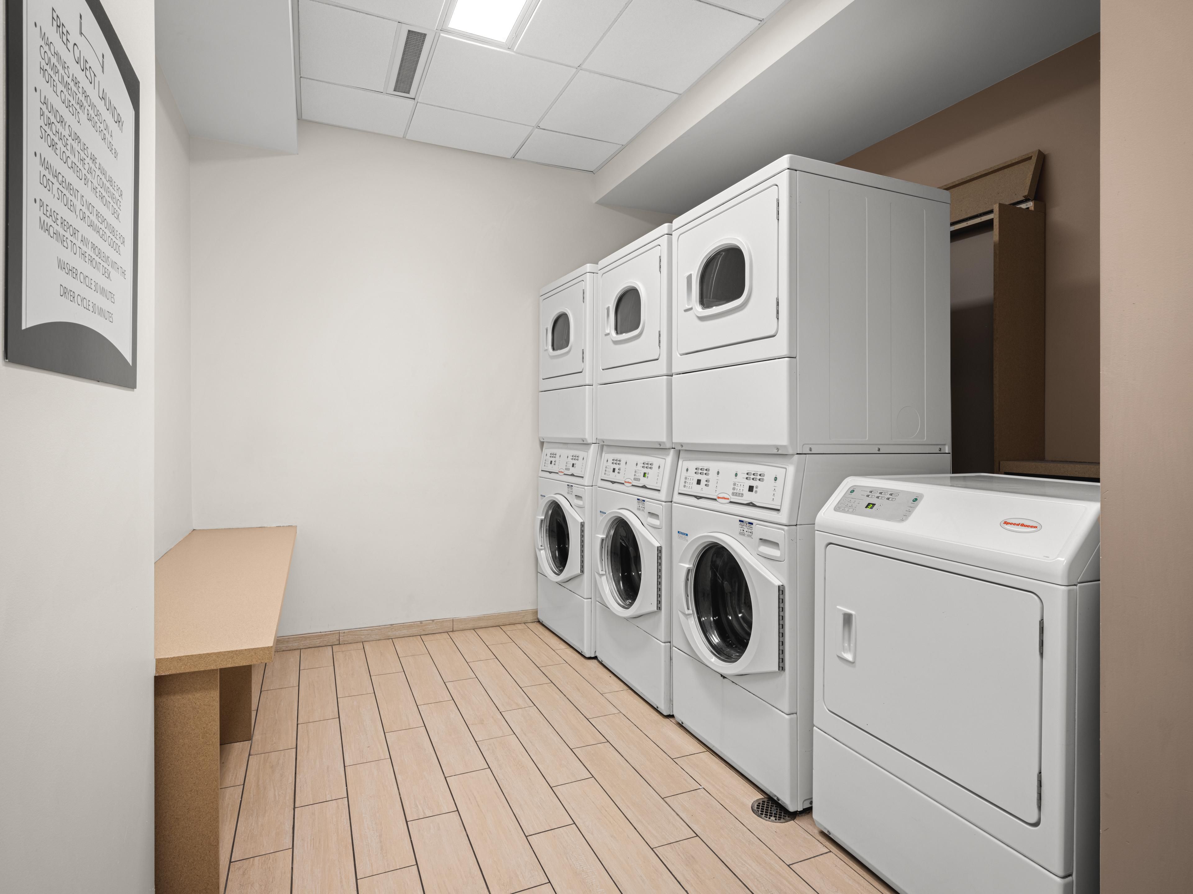 Laundry room with washers an dryers