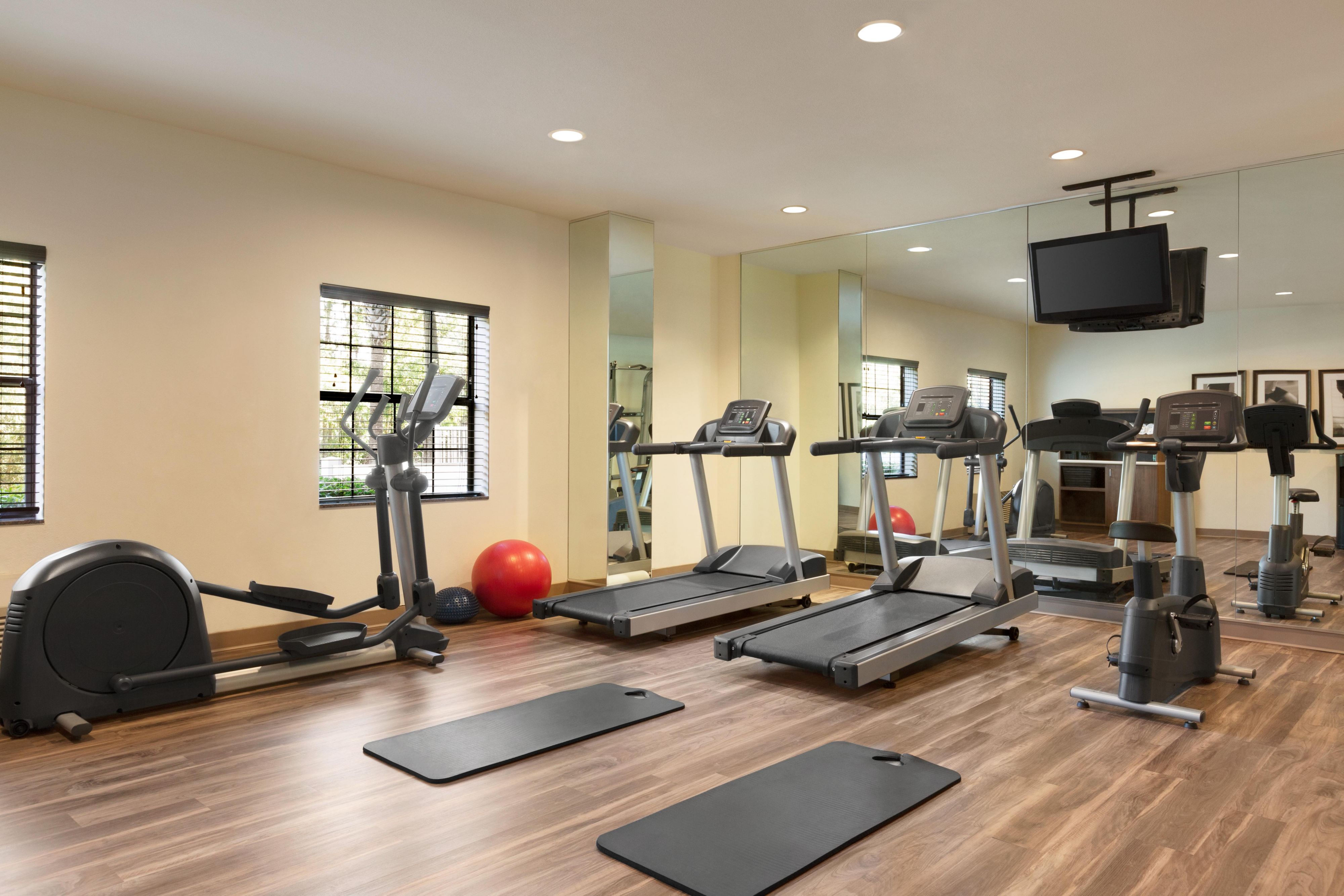 Break a sweat at our 24-hour fitness center with treadmills, ellipticals, weight bench, free weights, and exercise bikes. Complimentary towel service, water, and earbuds are offered for your workout.