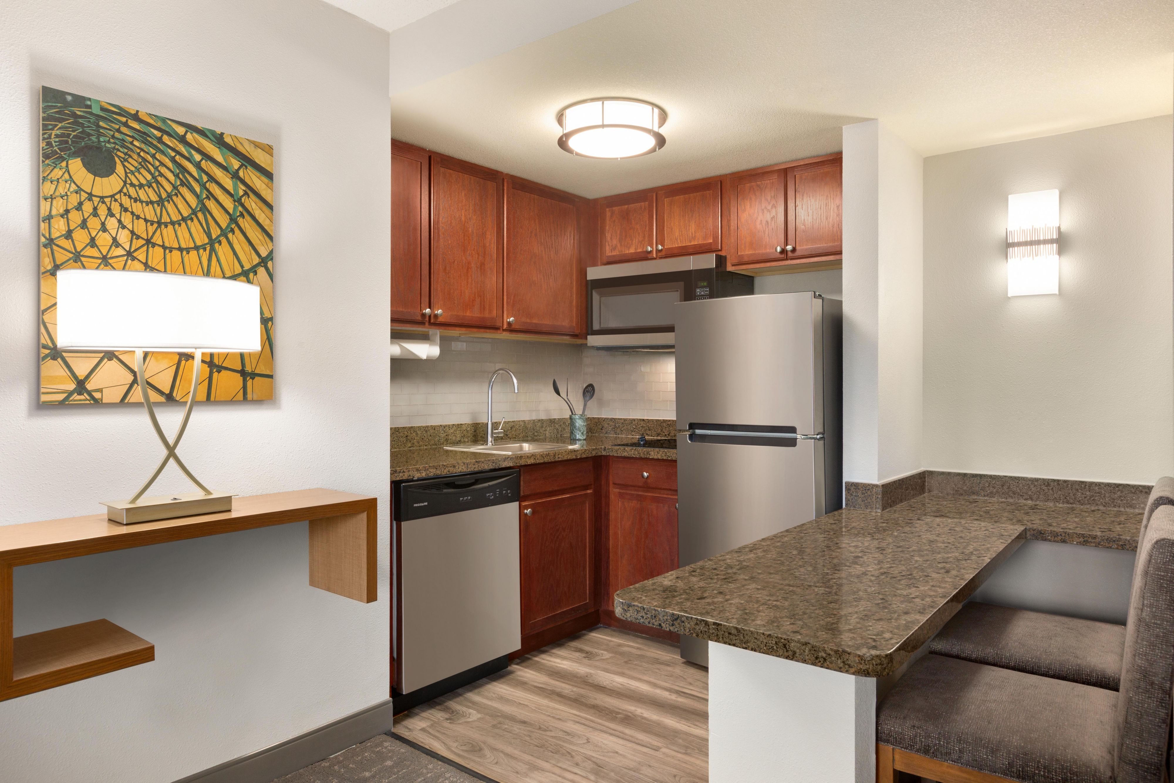 Enjoy all the comforts of home in our apartment-style suites with full kitchens. You'll have everything you need to make a great meal on the road with the ensuite stove, microwave oven, refrigerator, and cooking utensils.