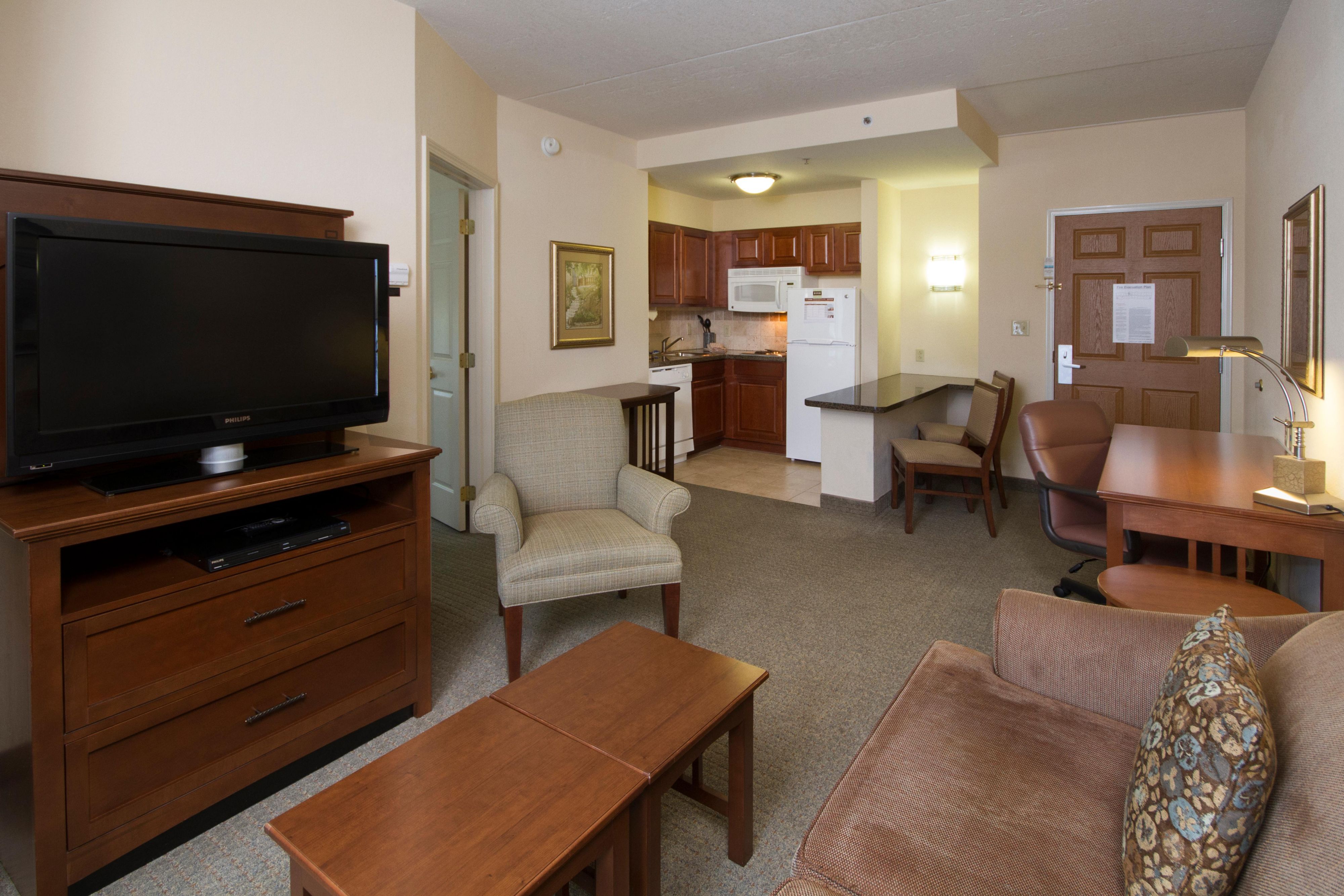 Our all-suite hotel comes with extra square footage and a fully equipped kitchen in every room.  Kitchens include a stove top, full size fridge, microwave, dishwasher, sink with garbage disposal, cookware, dinnerware and serve ware.  