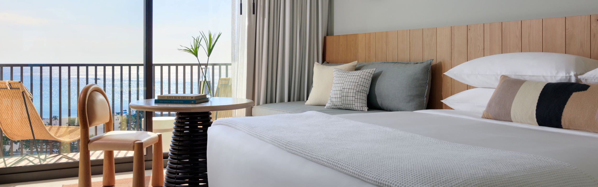 Coastal‑view guest room at Hotel Indigo Grand Cayman