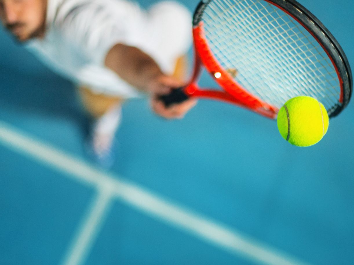 Tennis ball and racket