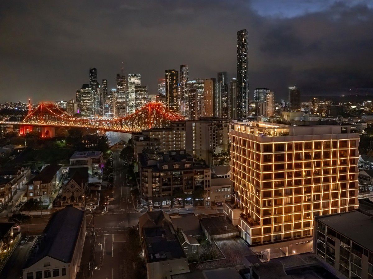 Brisbane skyline with illuminated bridge and buildings