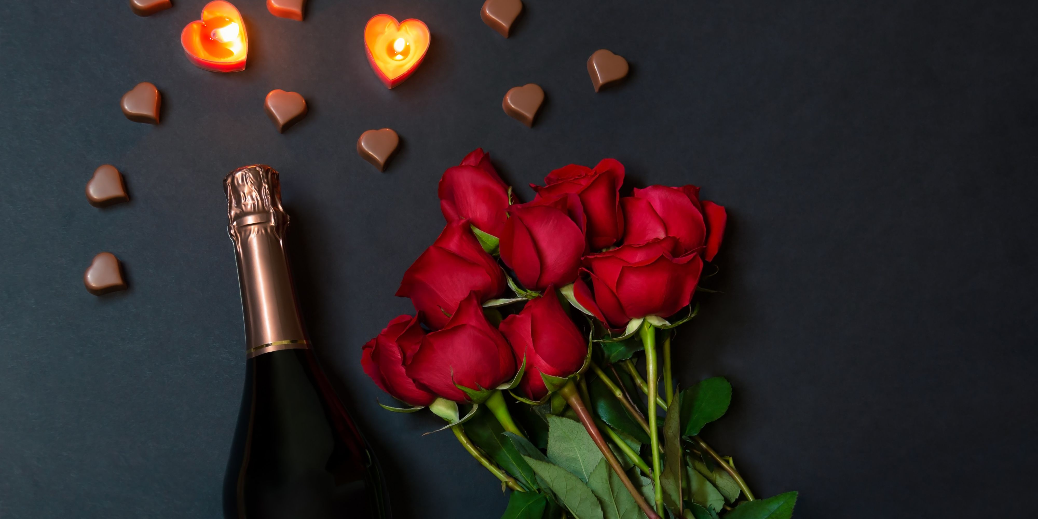 champagne bottle and roses