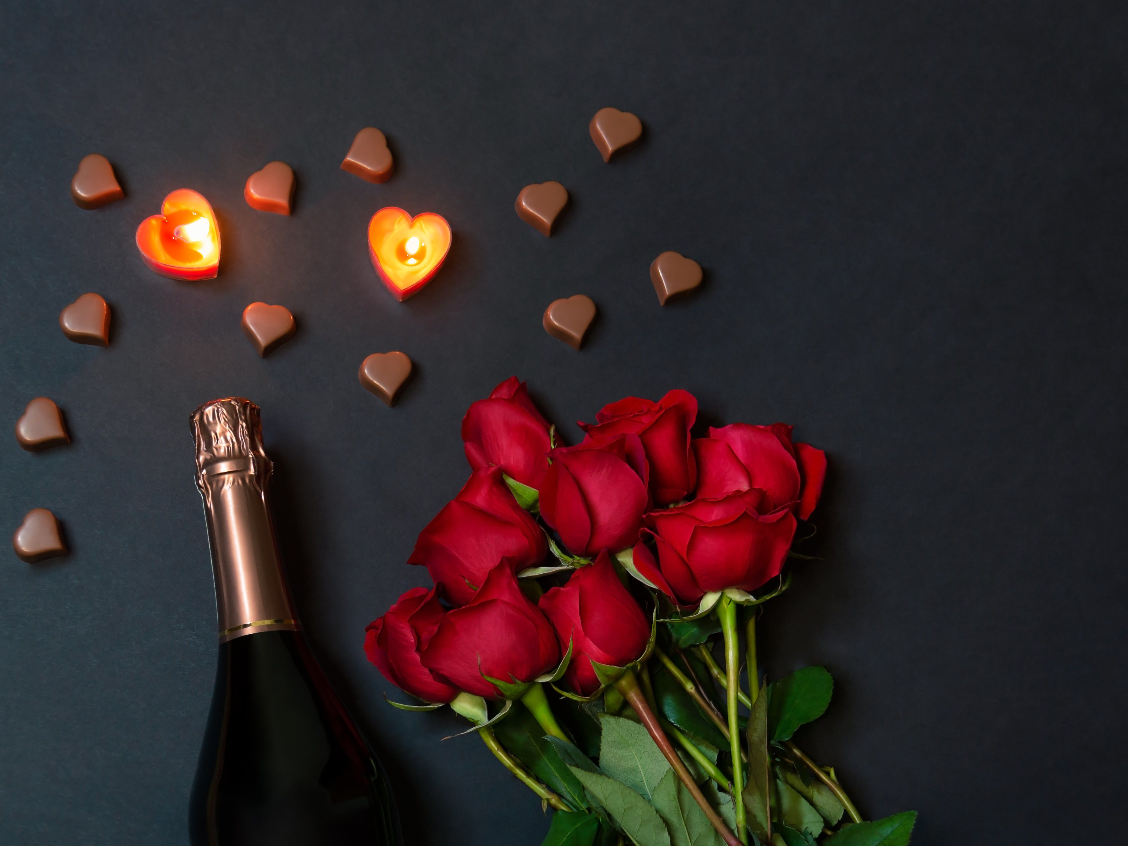 Valentines roses and champange with candles