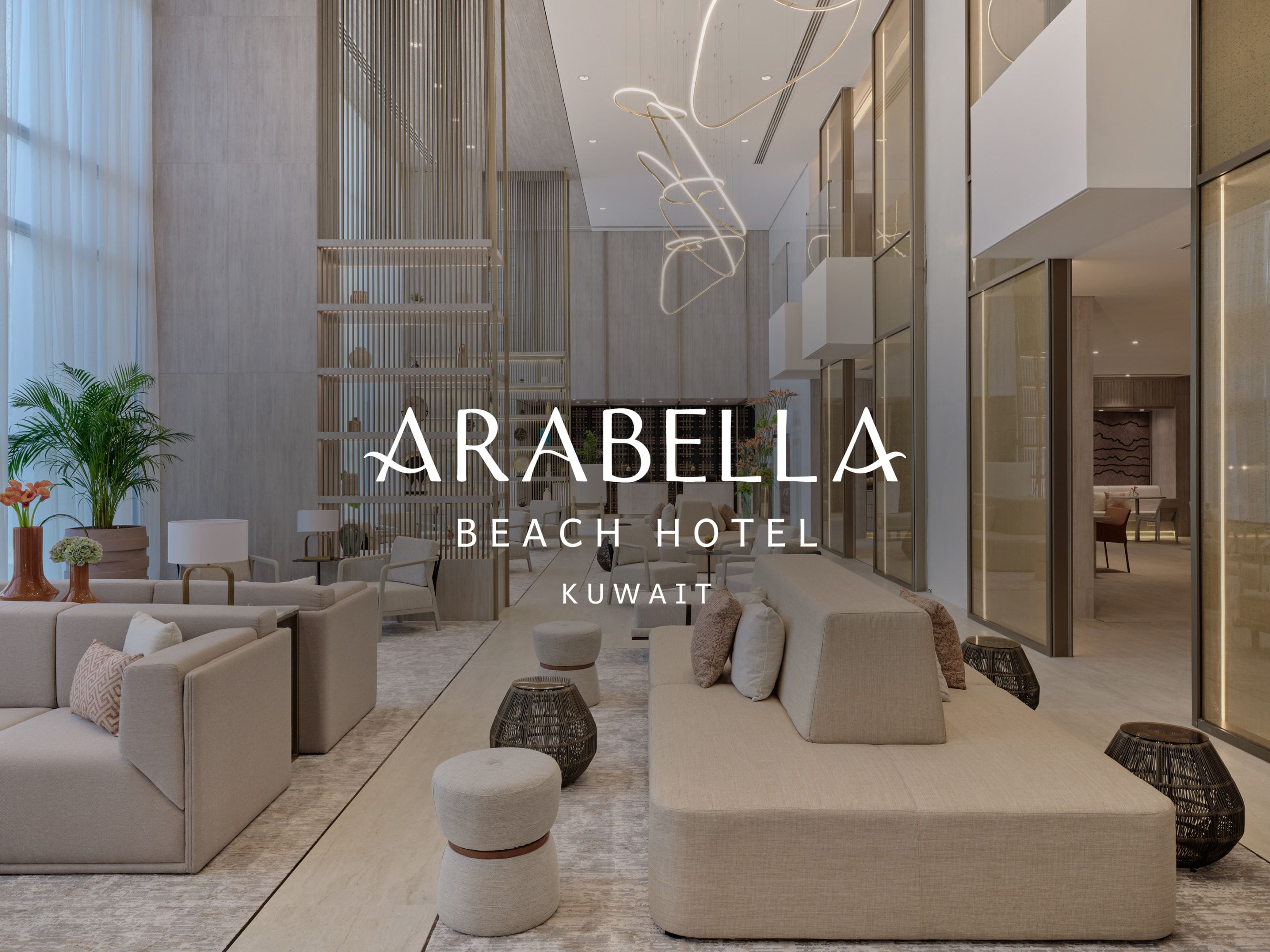 lobby with neutral luxurious decor and tall ceilings