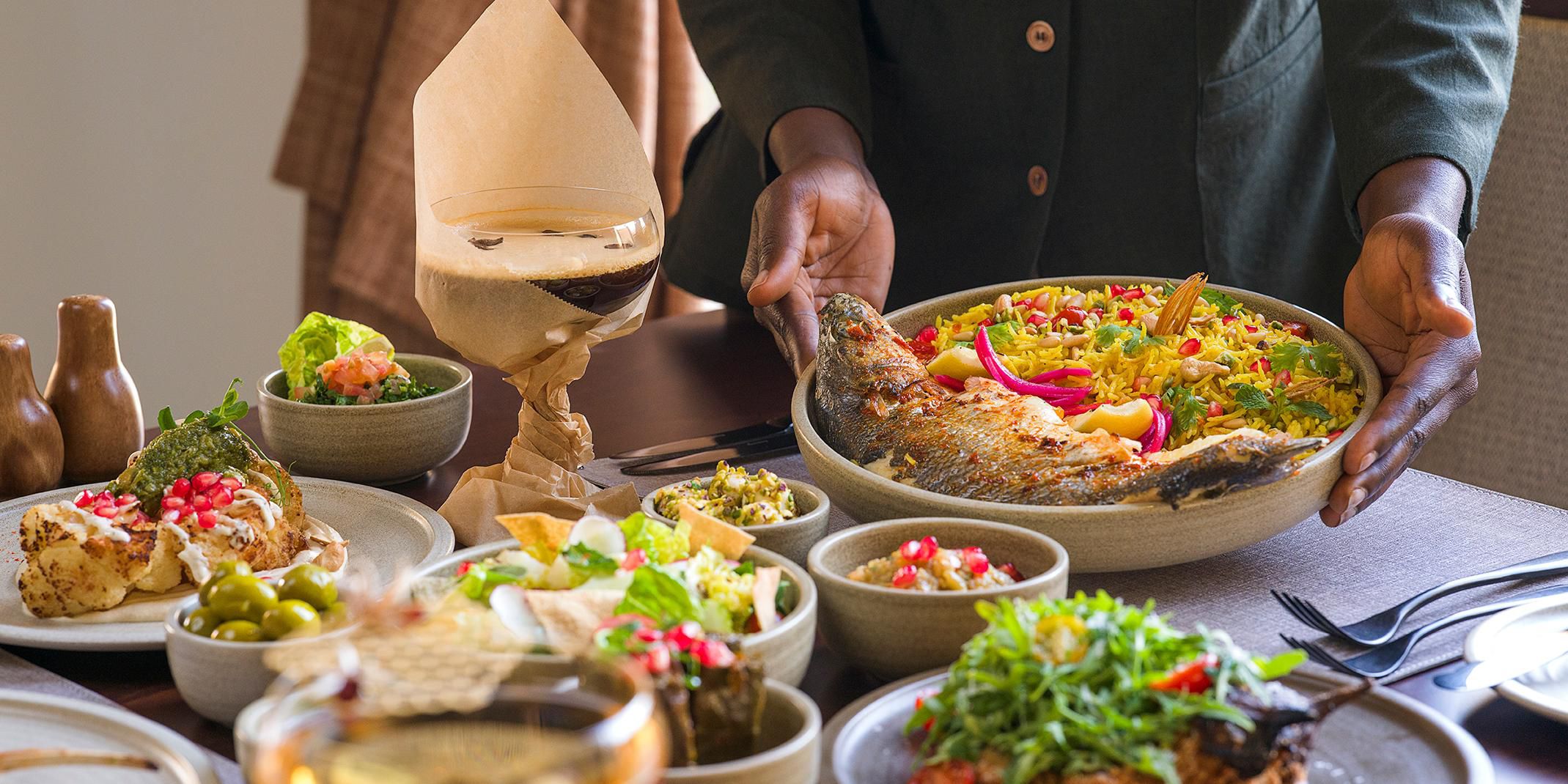 Experience a trio of distinct dining venues offering something for every palate. From all-day dining blending local and international flavors to immersive desert-facing dinners with live performances, and a speakeasy-style lounge serving creative cocktails, cigars, and bar bites.