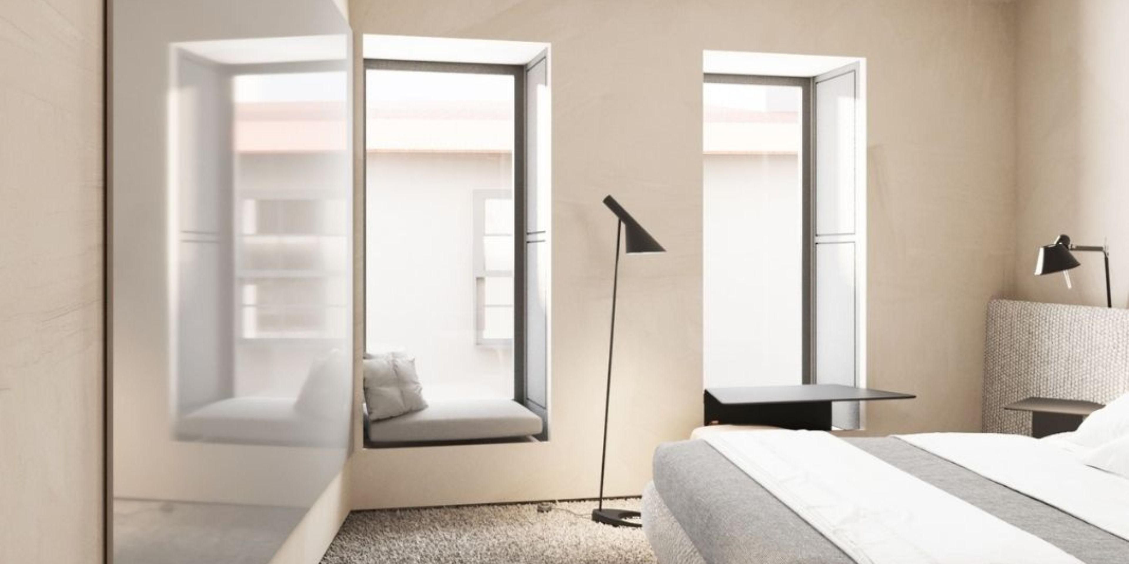 Soft light and space define this Braga hotel room