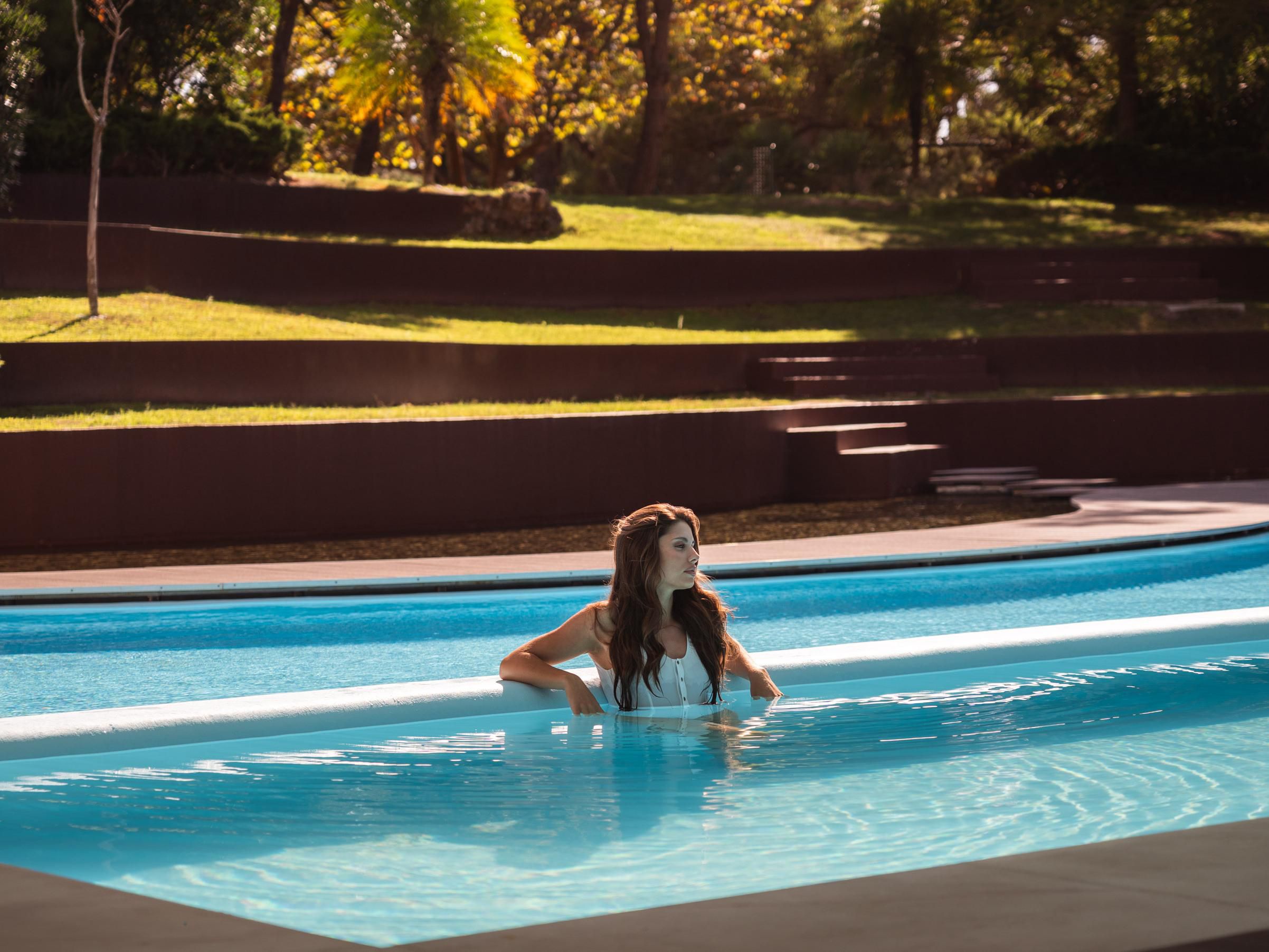 Soak up the sun by our stunning outdoor pool in Cascais.