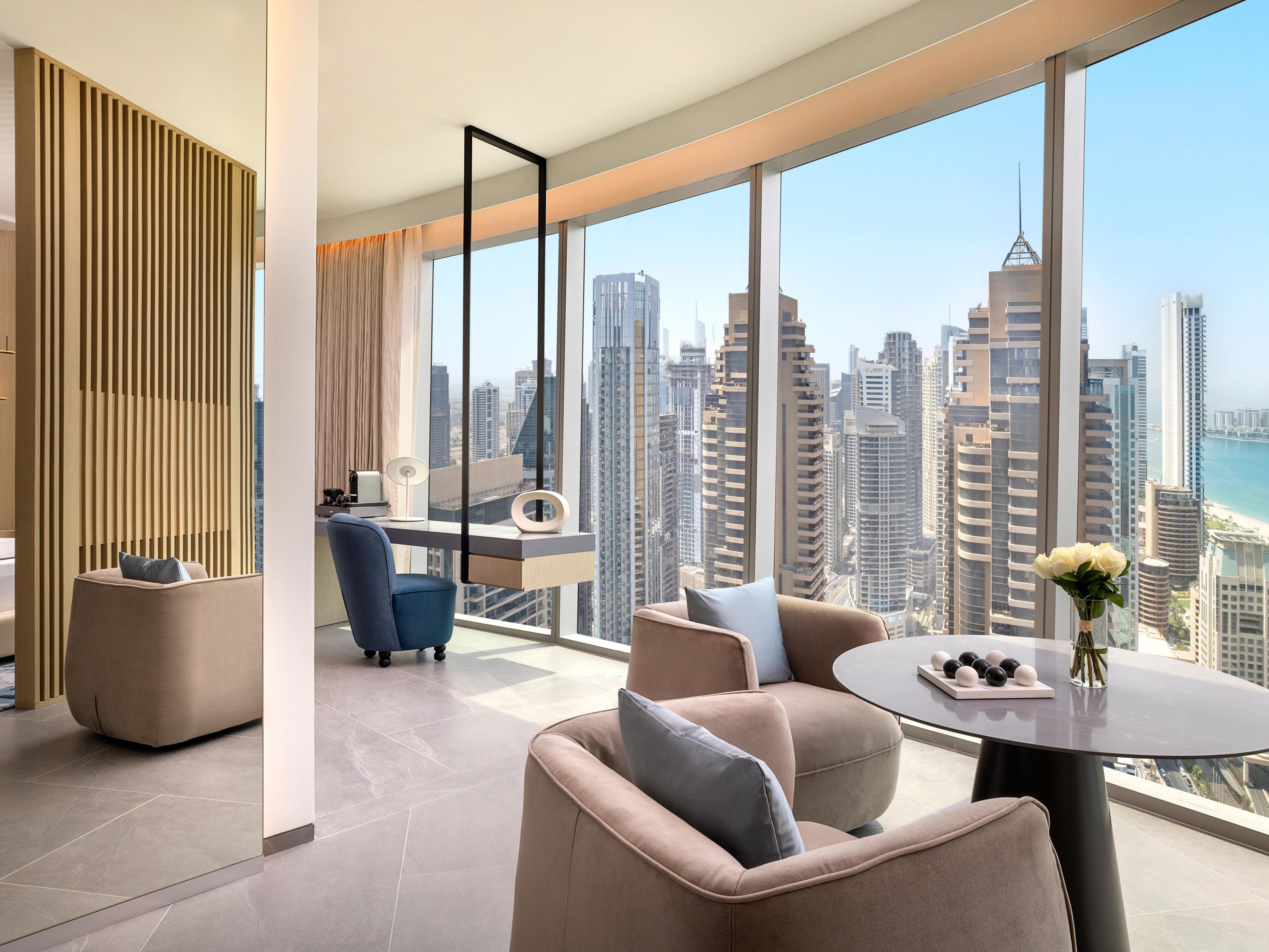 Spacious living area framed by Dubai Marina’s skyline views