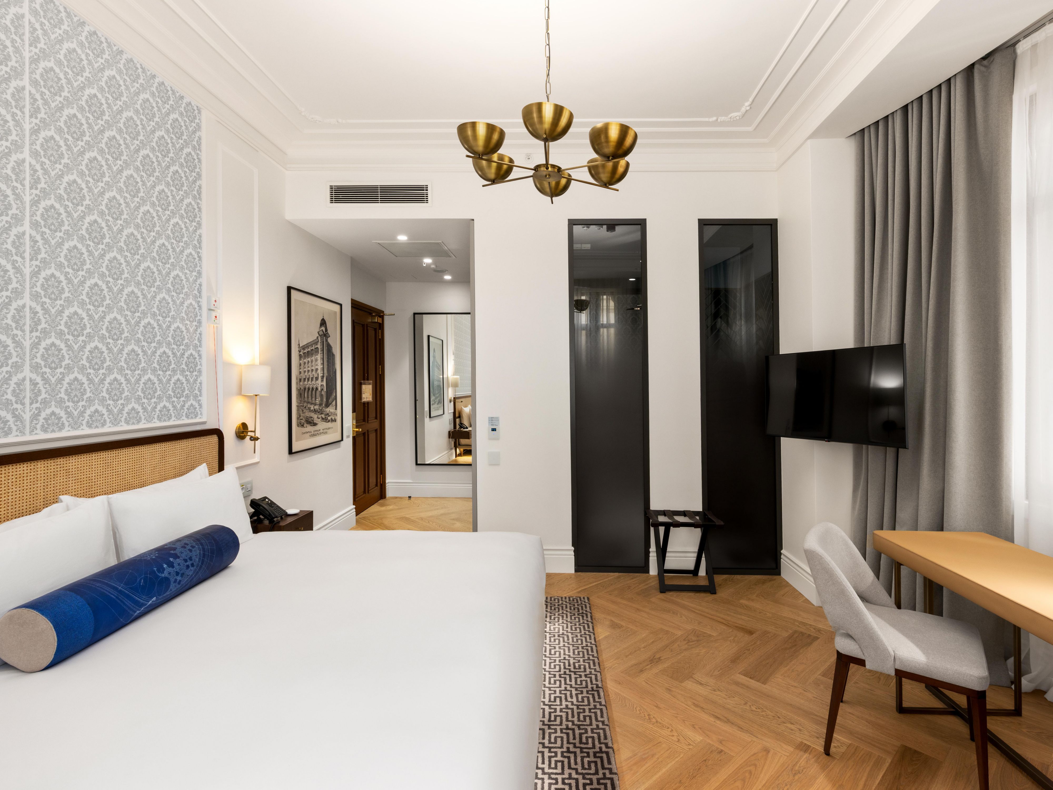Enjoy a spacious room with a writing desk and comfortable bed