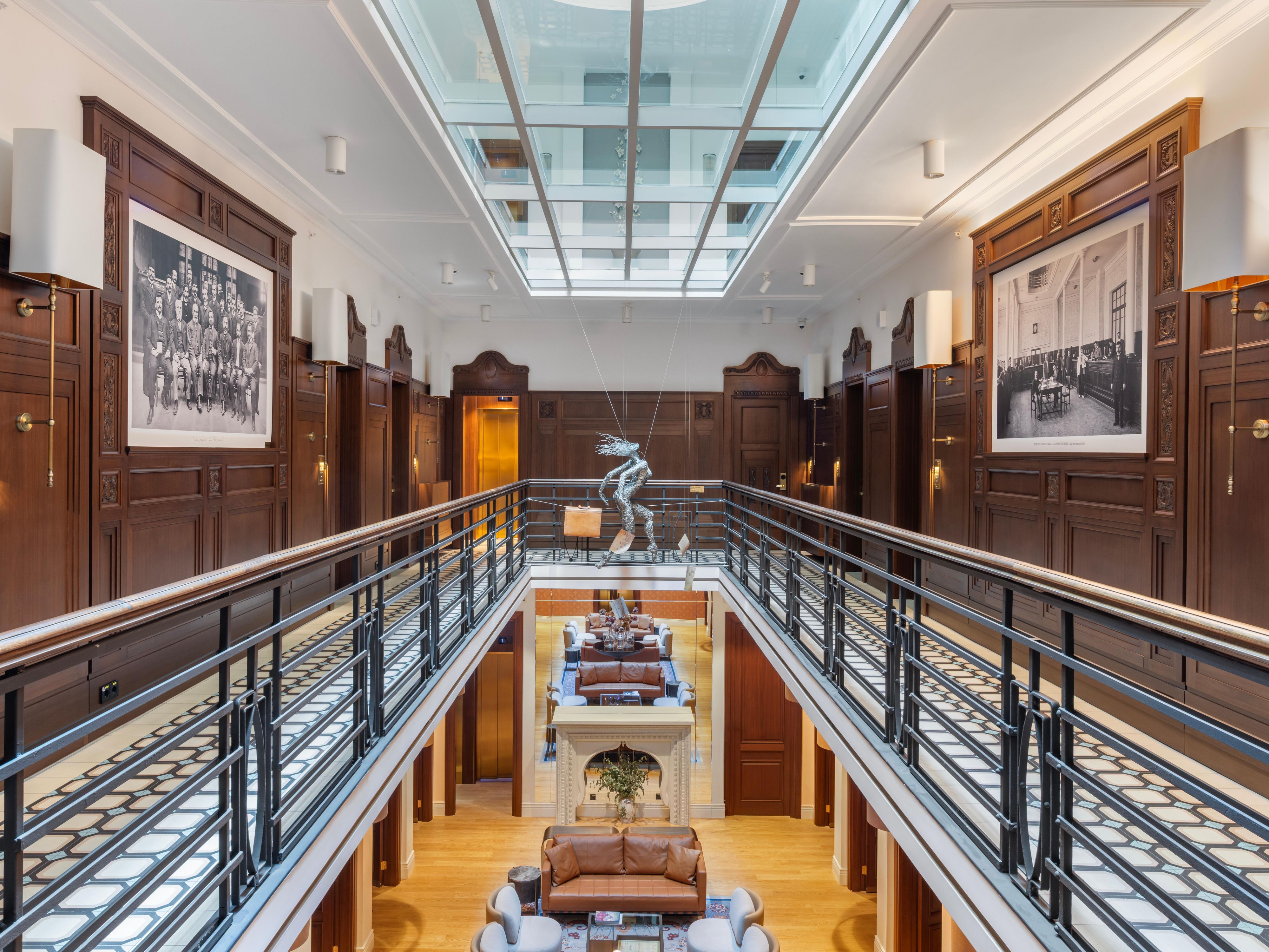 Move through bright corridors shaped by historic details