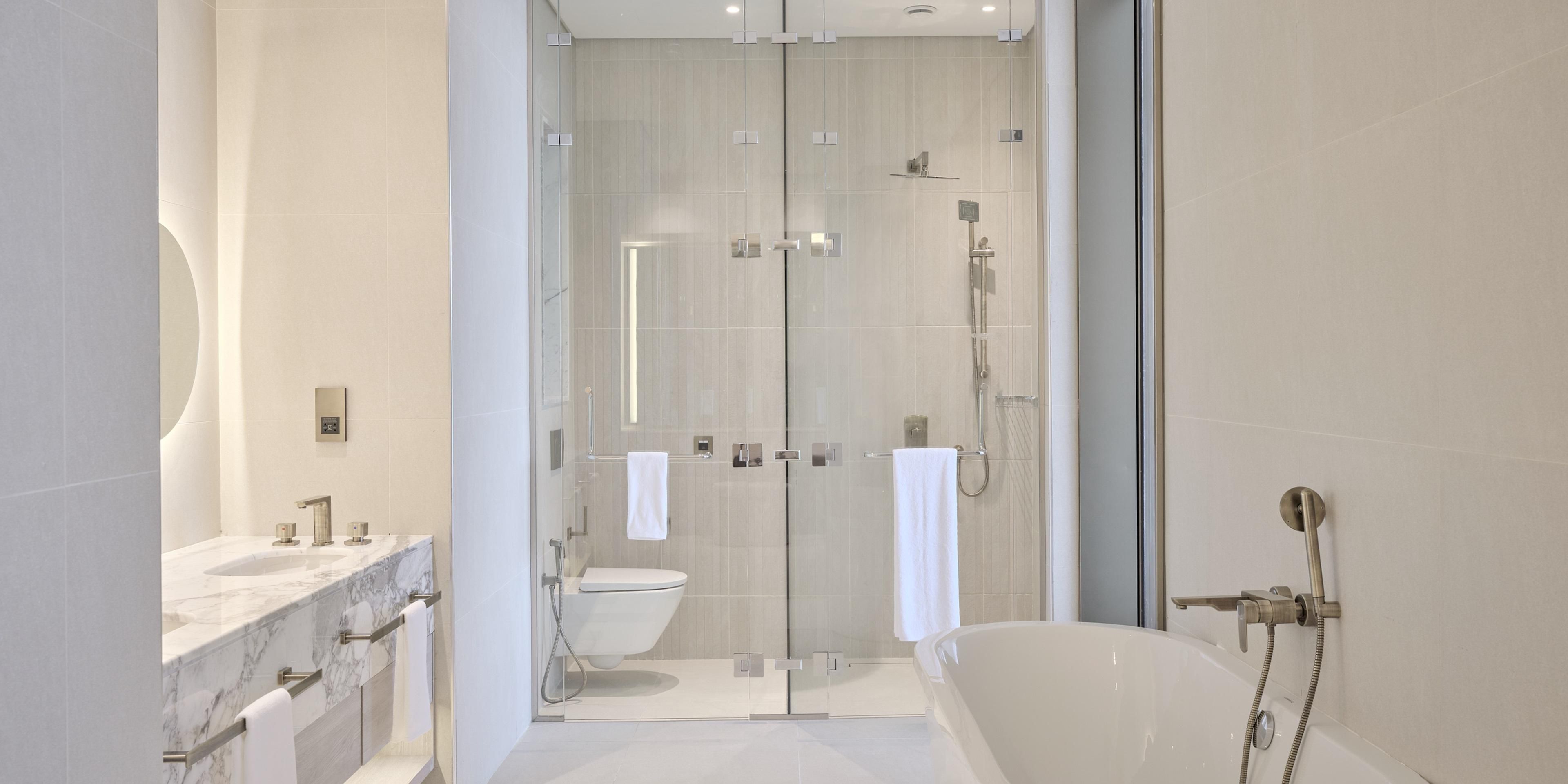 The suite bathroom offers space and comfort 