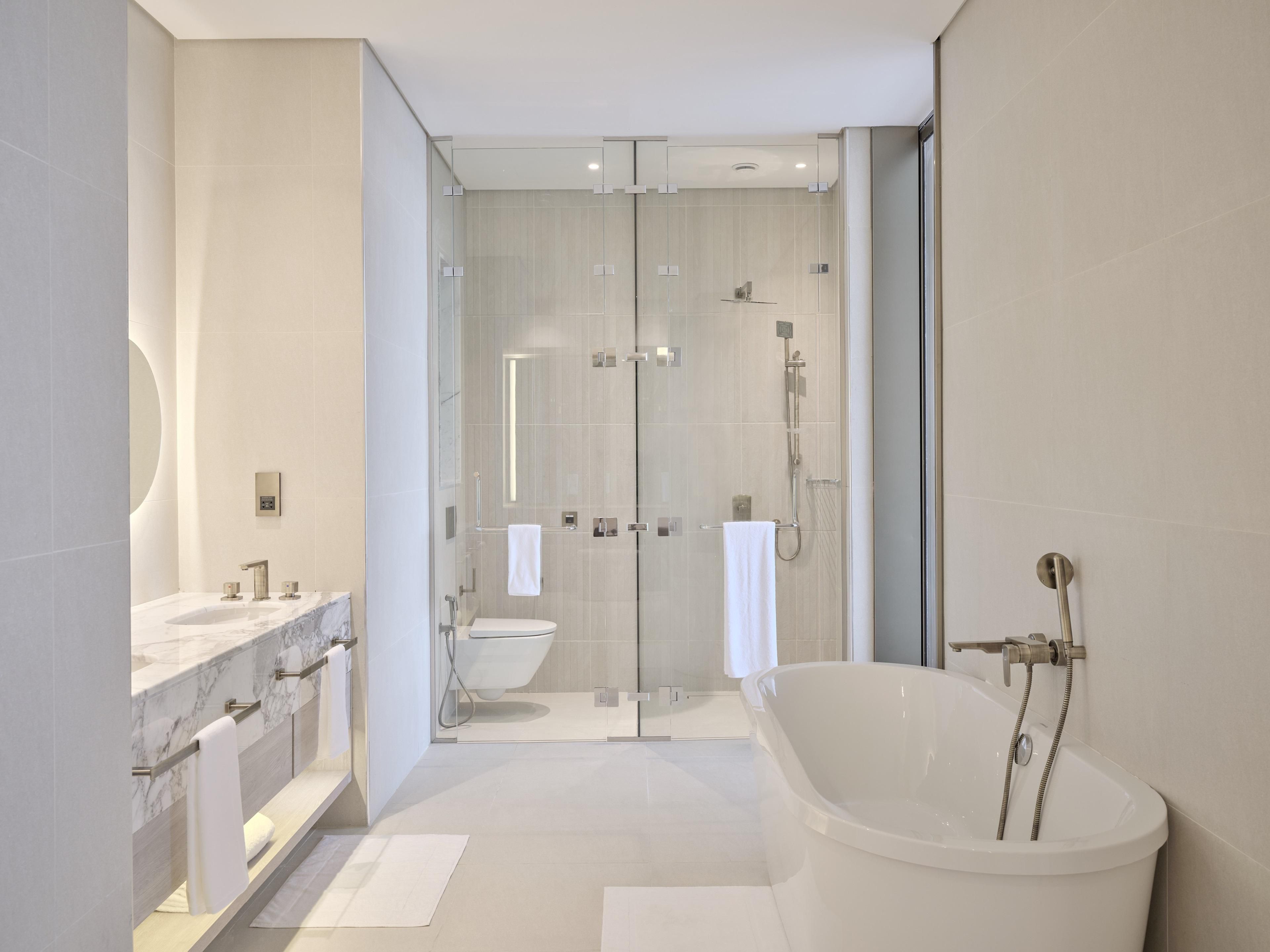 The suite bathroom offers space and comfort 
