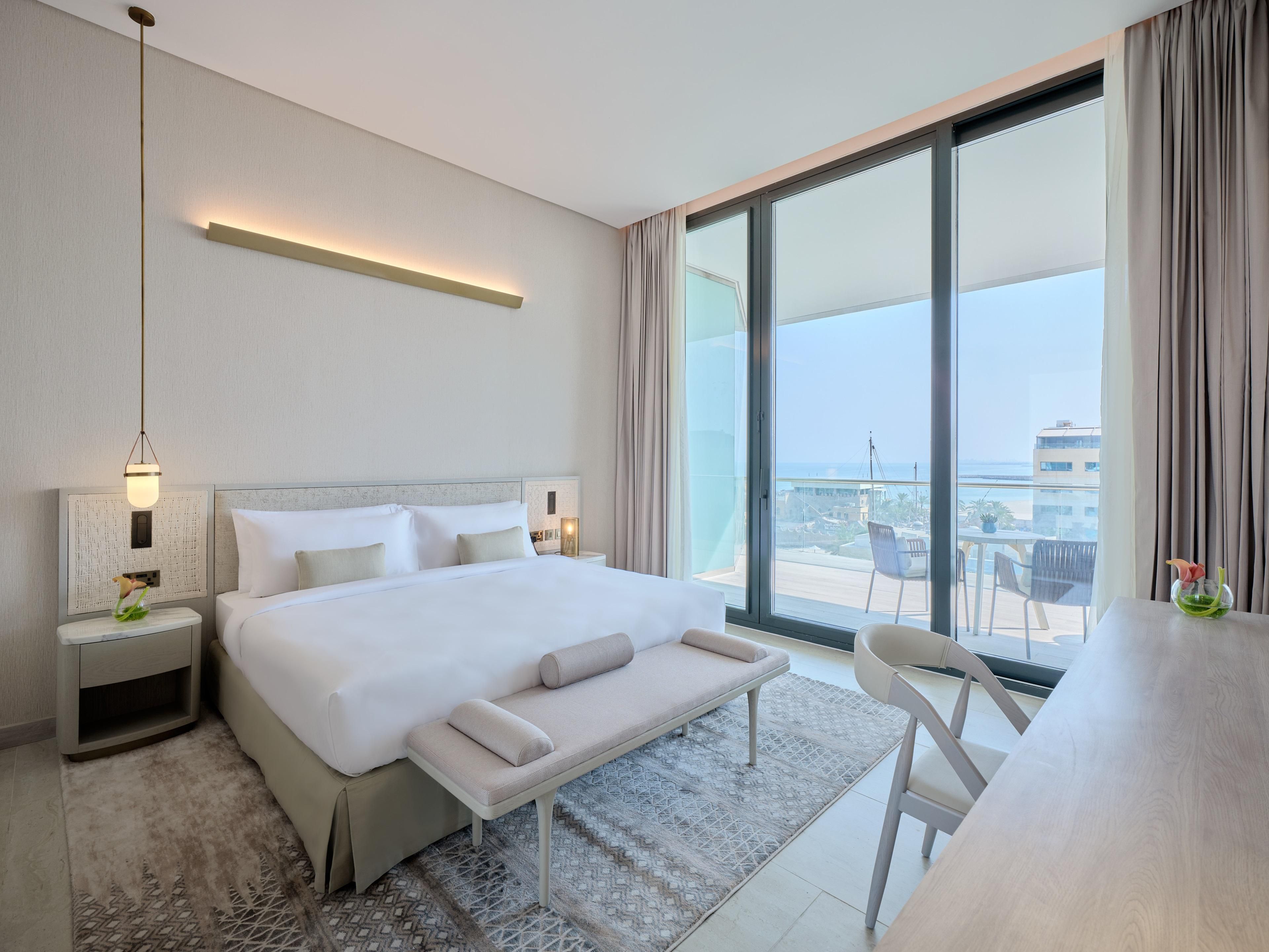 Our suites offer luxury and comfort with Arabian Gulf views