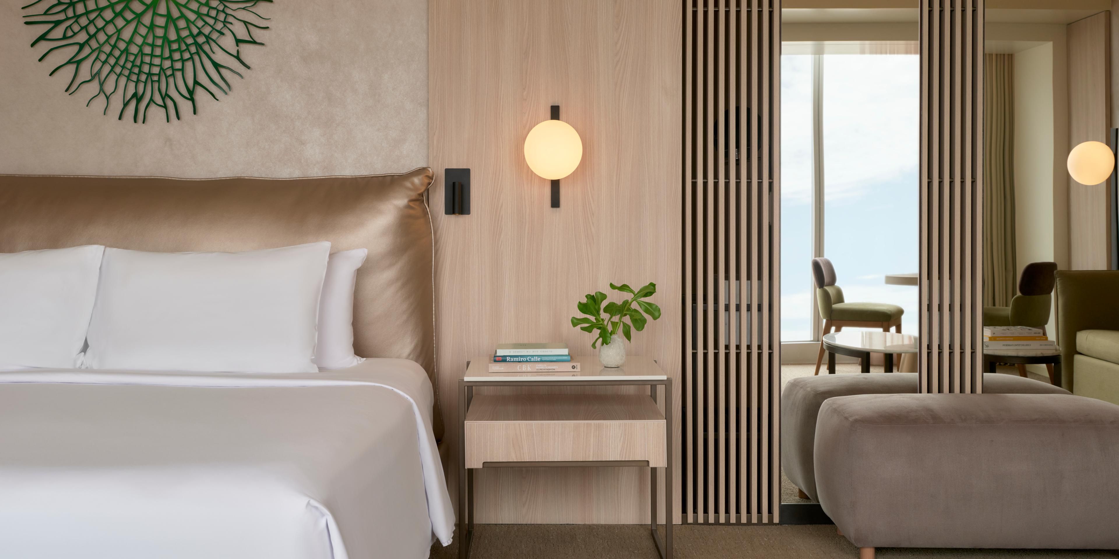 Wake up to breathtaking ocean views in the Premium Sea View Room.