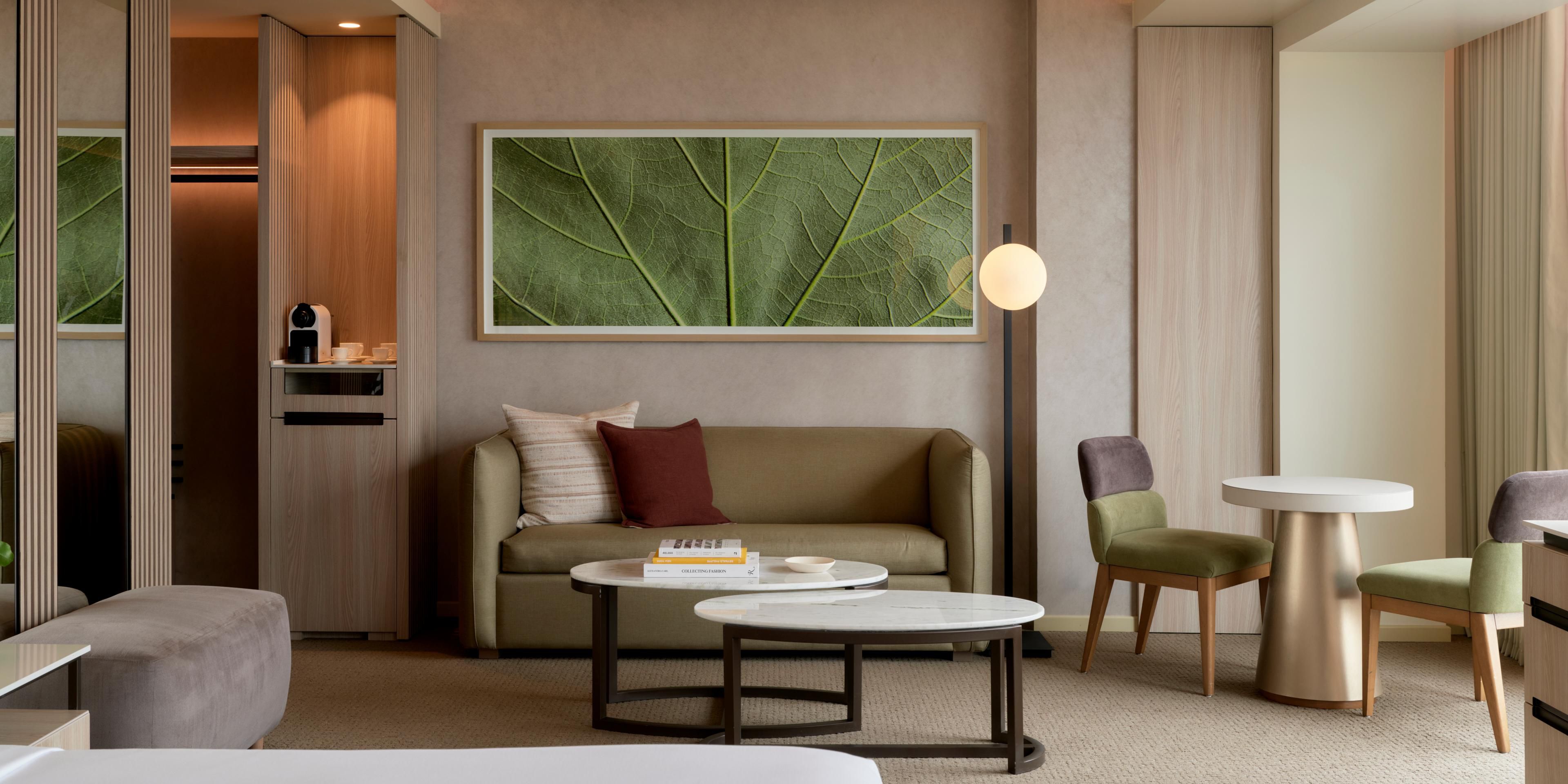 Relax in the Premium Sea View Room’s sitting area with ocean views
