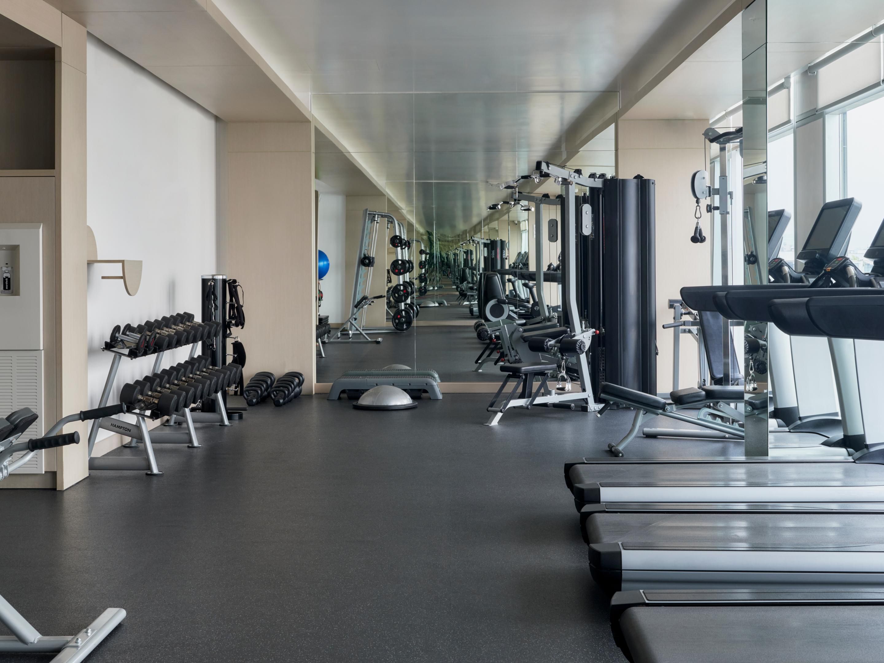 Stay active with top-notch equipment and city views at SOUMA Gym.