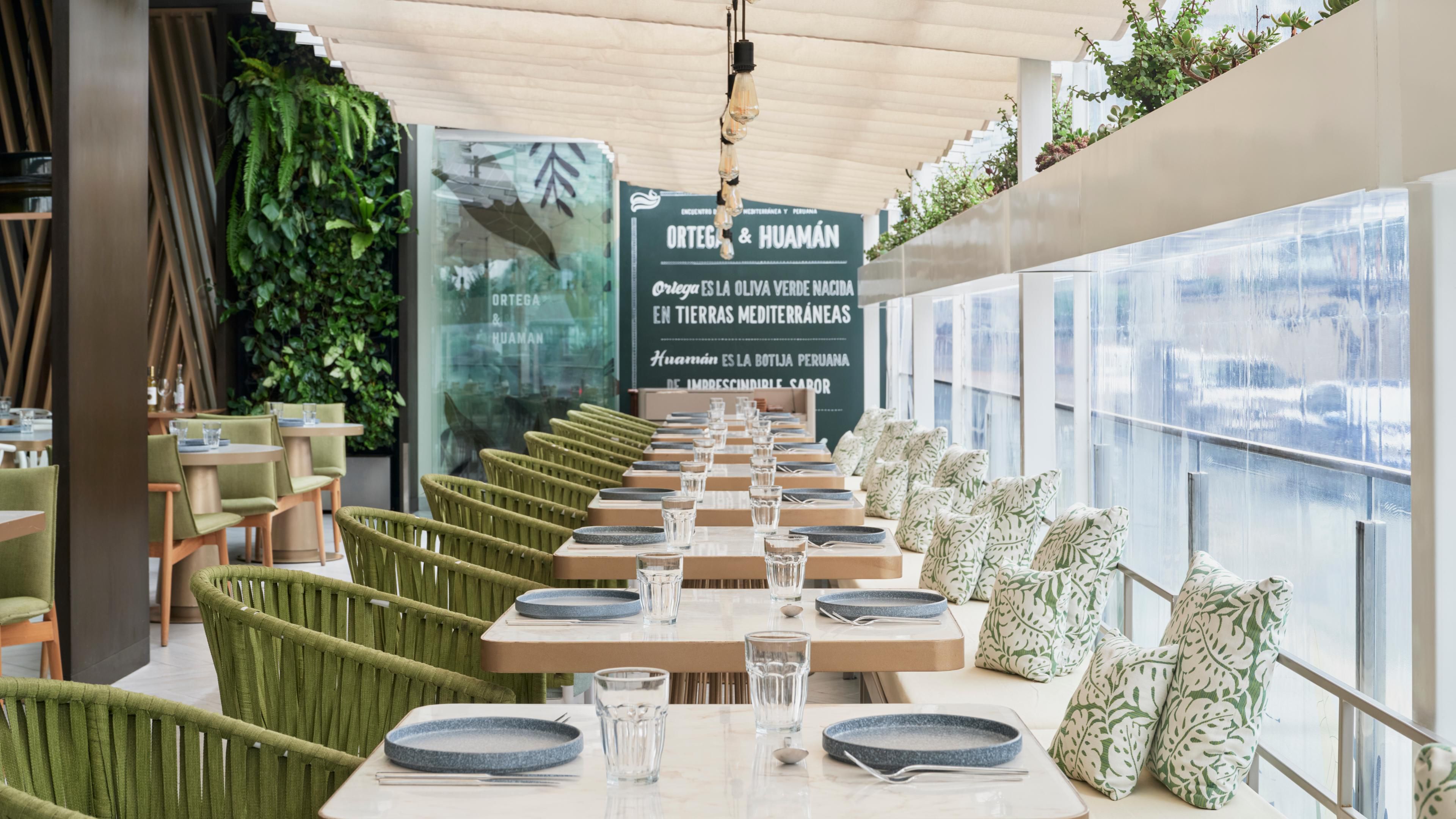 Interior of Ortega and Huaman restaurant with plenty of comfortable seating