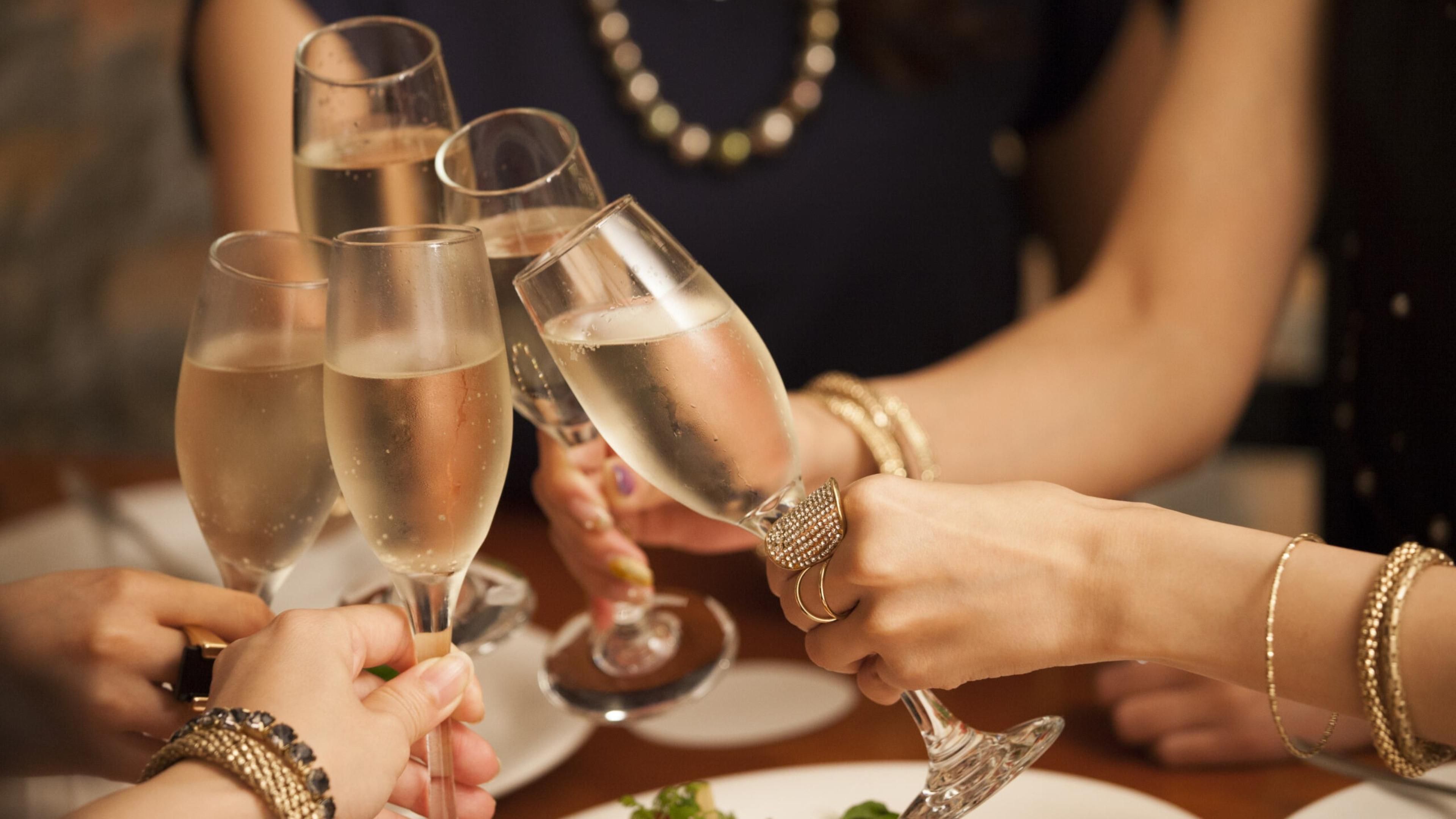 Guests toasting with glasses of champagne