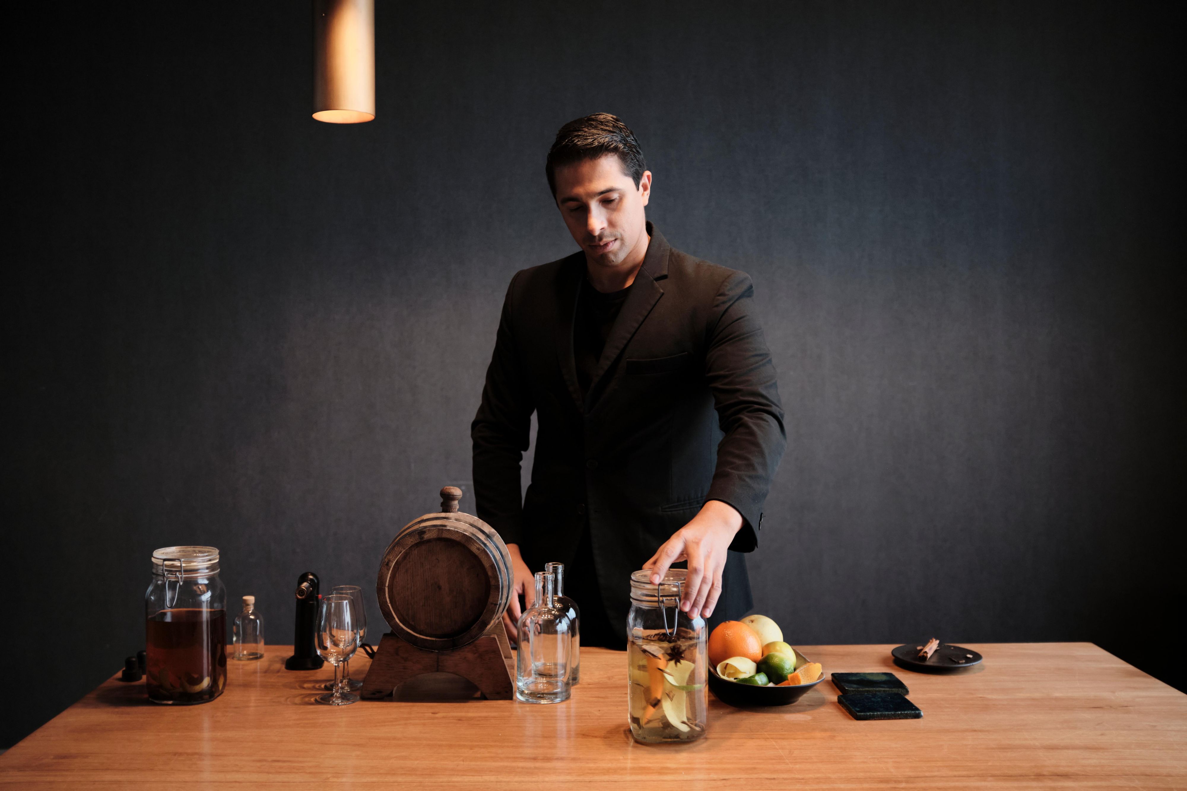 Man preparing Pisco drink.