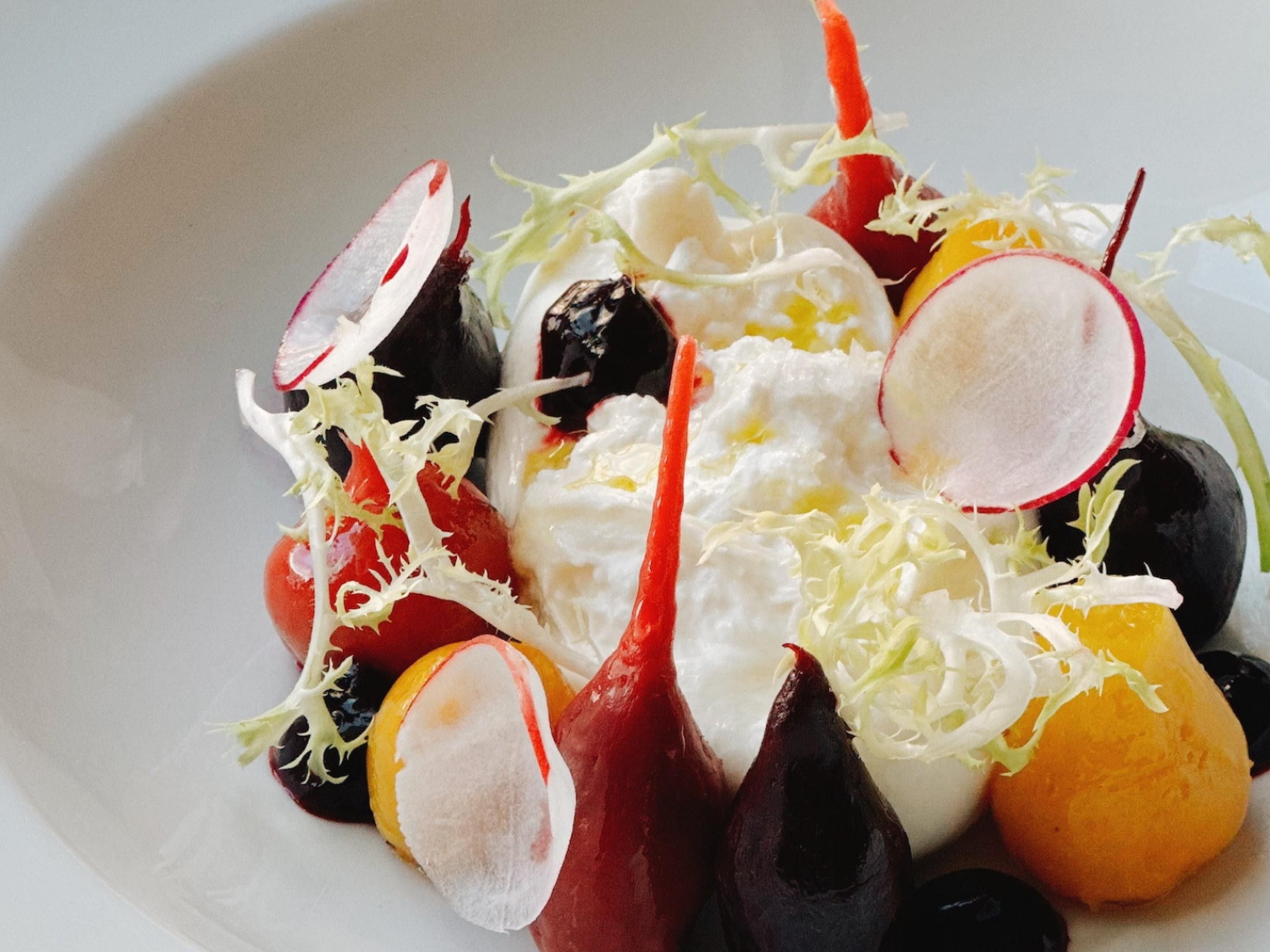 Fresh burrata, beetroot, radish and citrus medley dish
