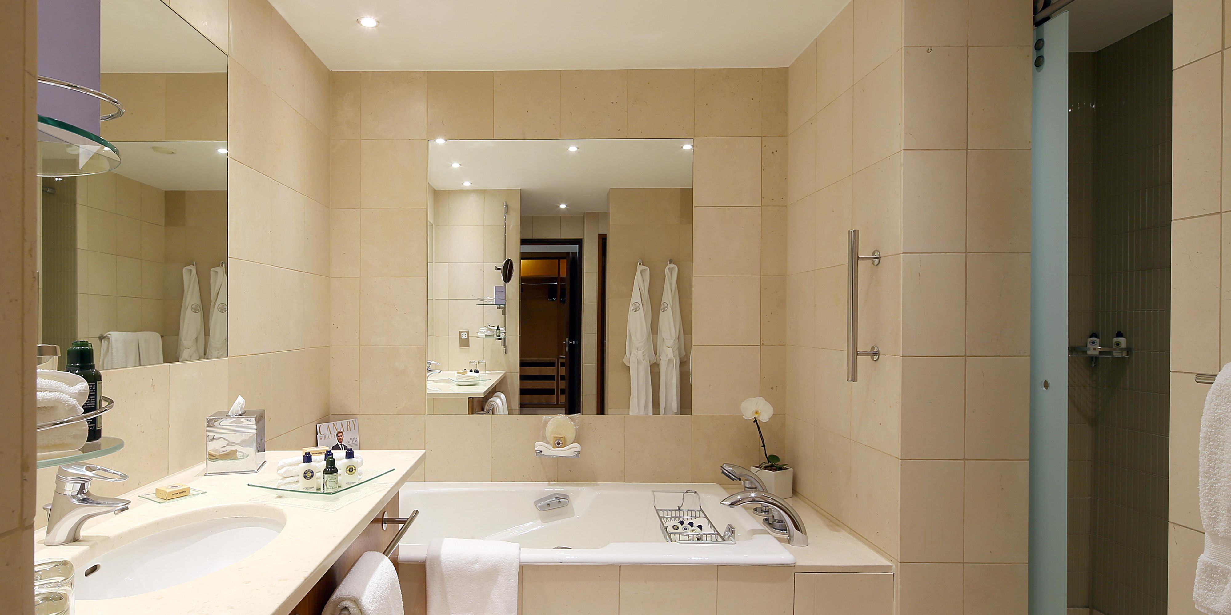 A bright marble bathroom designed for longer stays