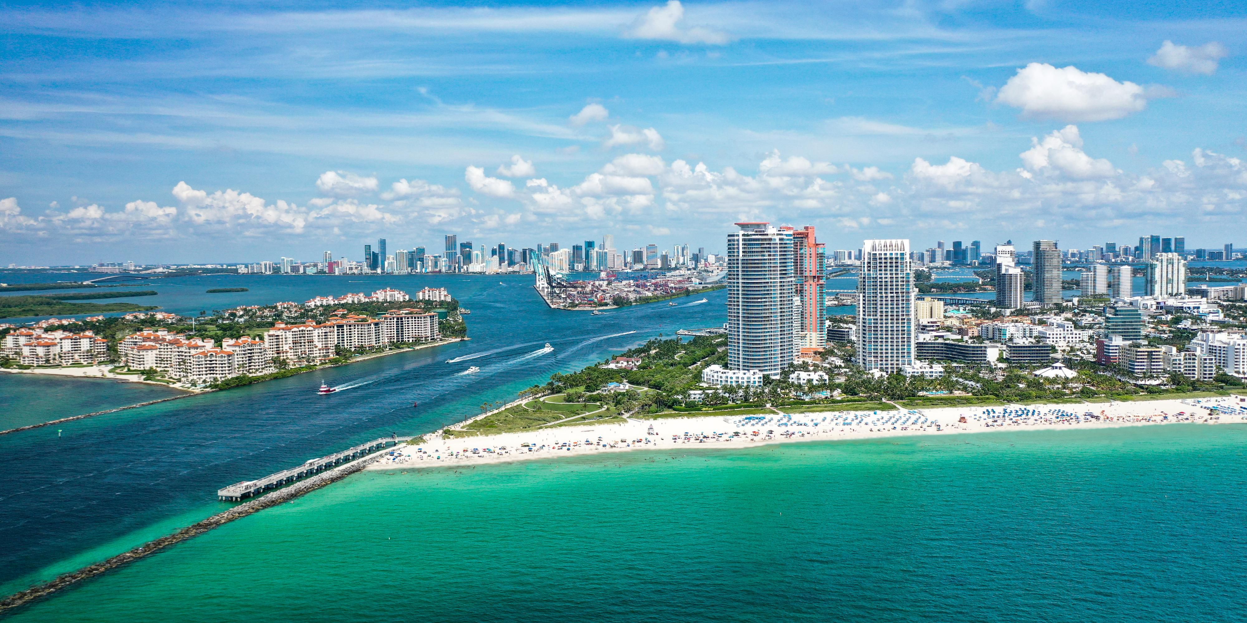 Turquoise water meets the shore and Miami skyline.