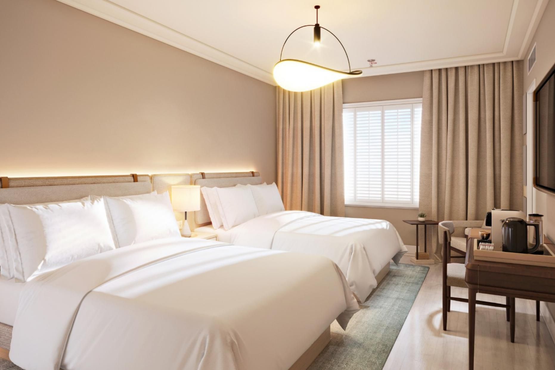 Settle into our double queen room.