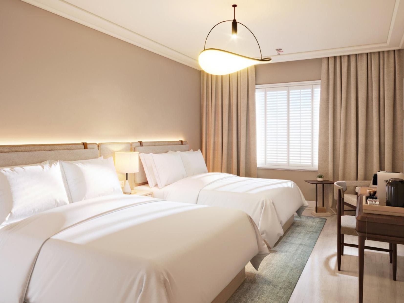 Settle into our double queen room.