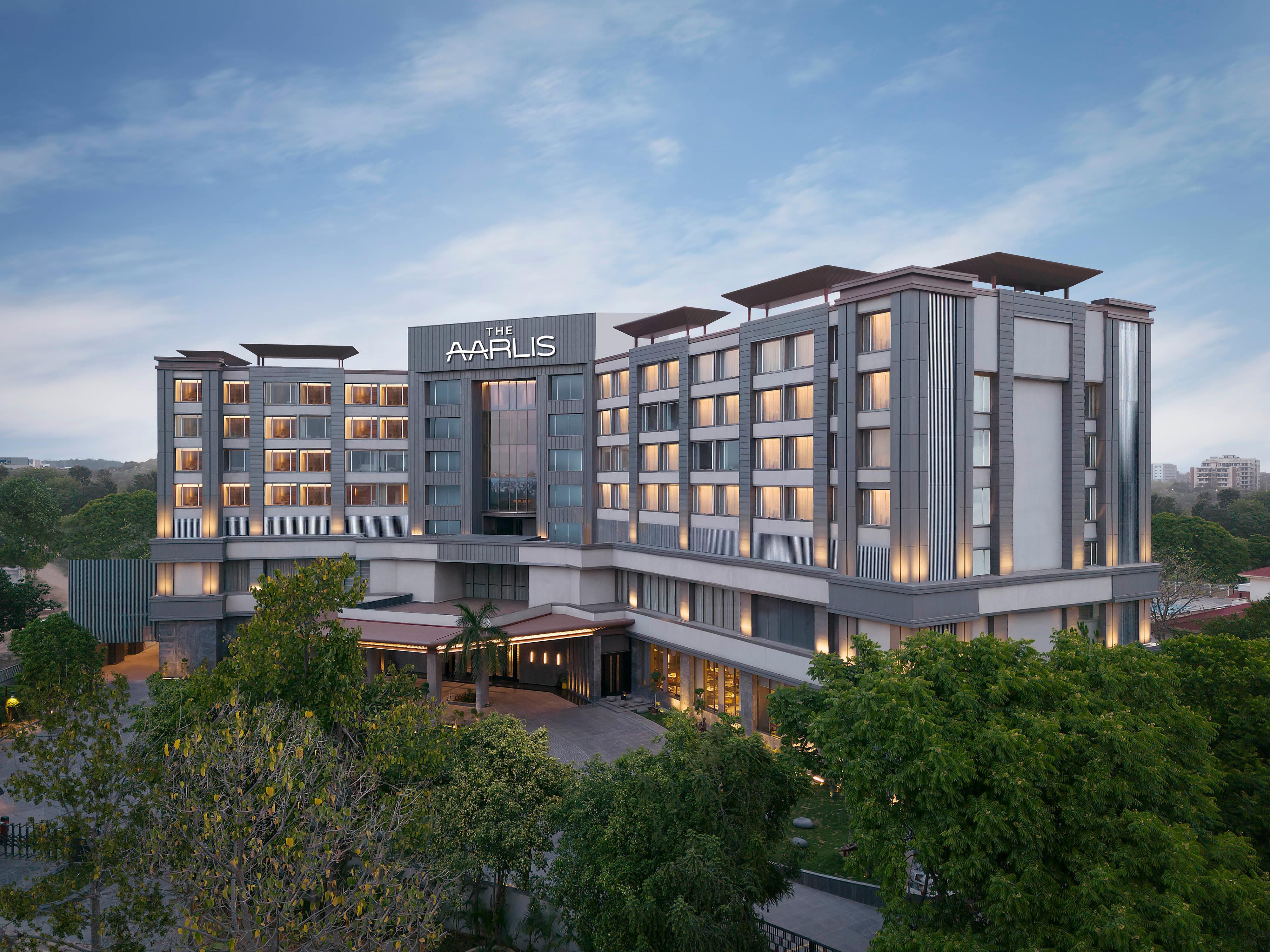 Watch the city shift gently as our hotel facade comes into view