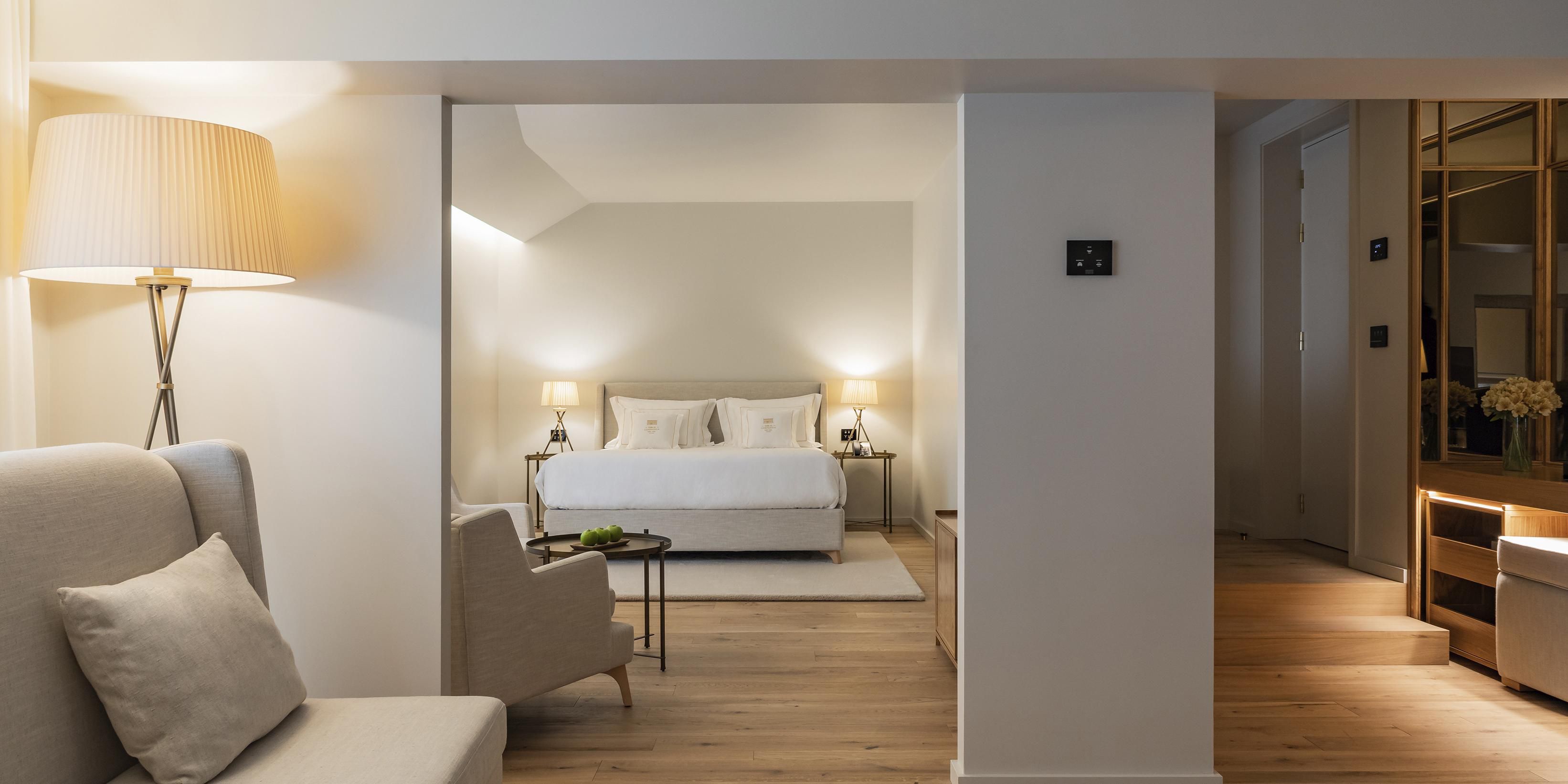 A sanctuary to unwind, with king size bed, living area and bathtub