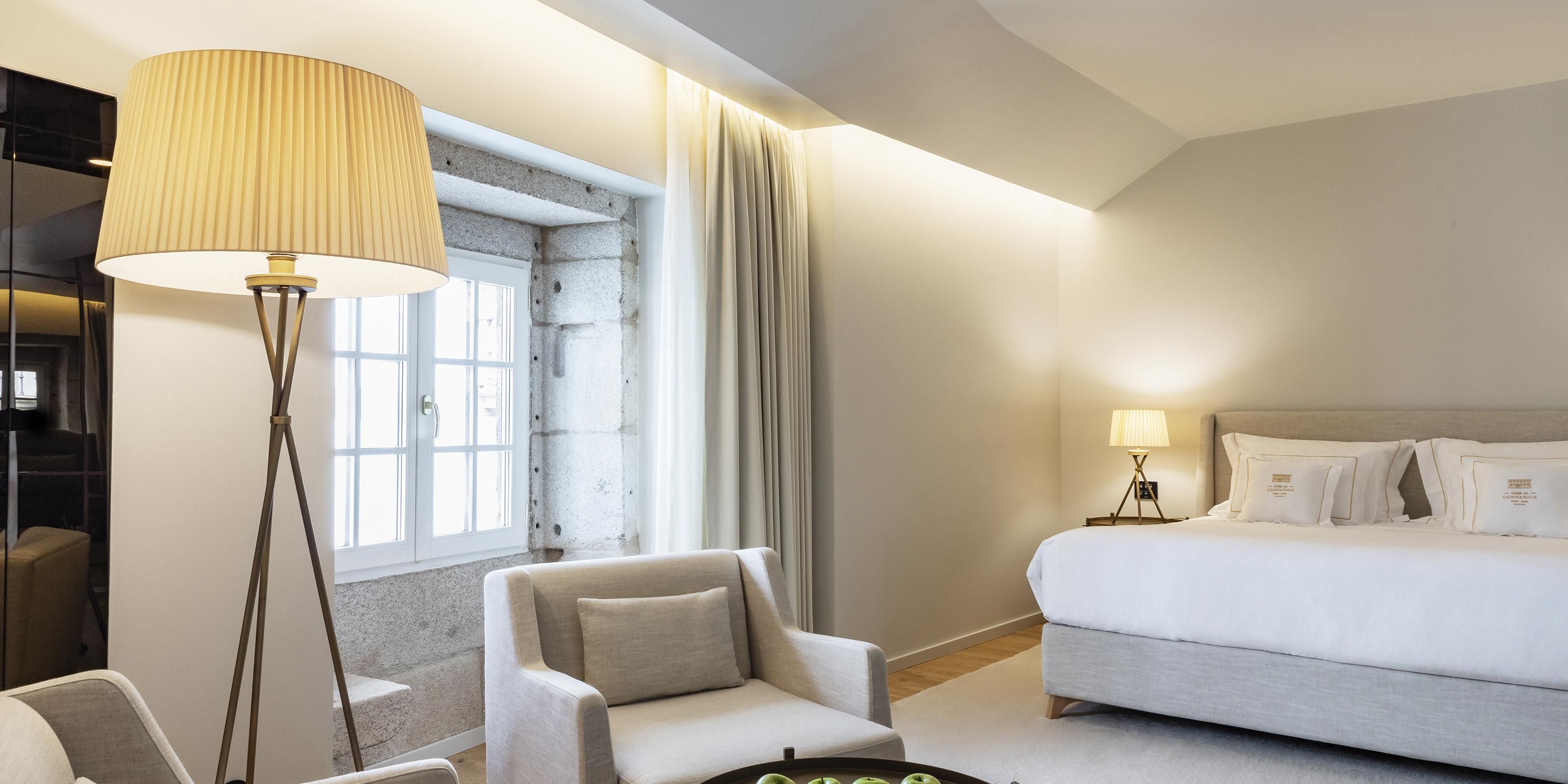 Your Portuguese haven, with king size bed, living area and bathtub