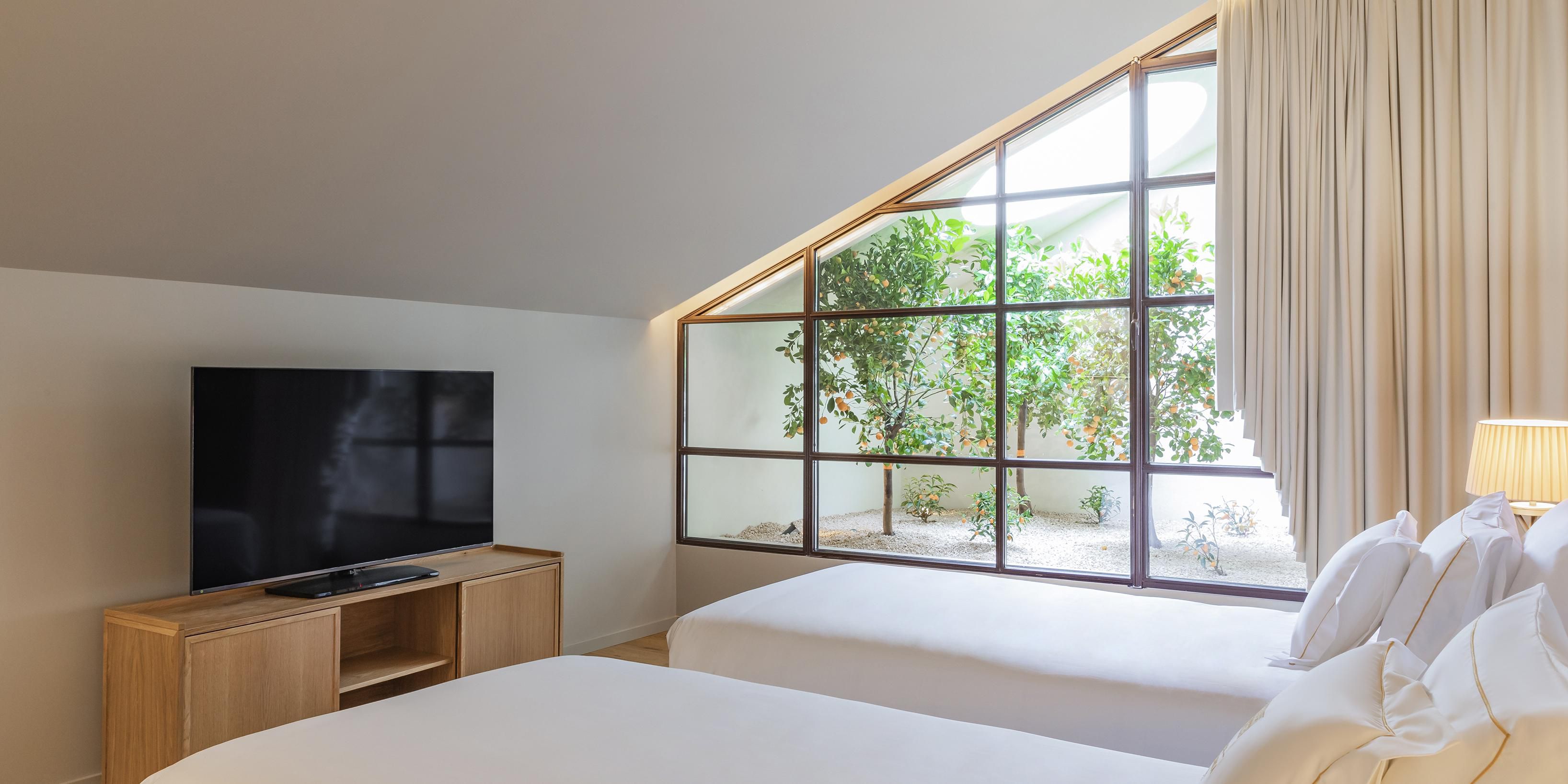 Twin room, where heritage and modern comfort meet