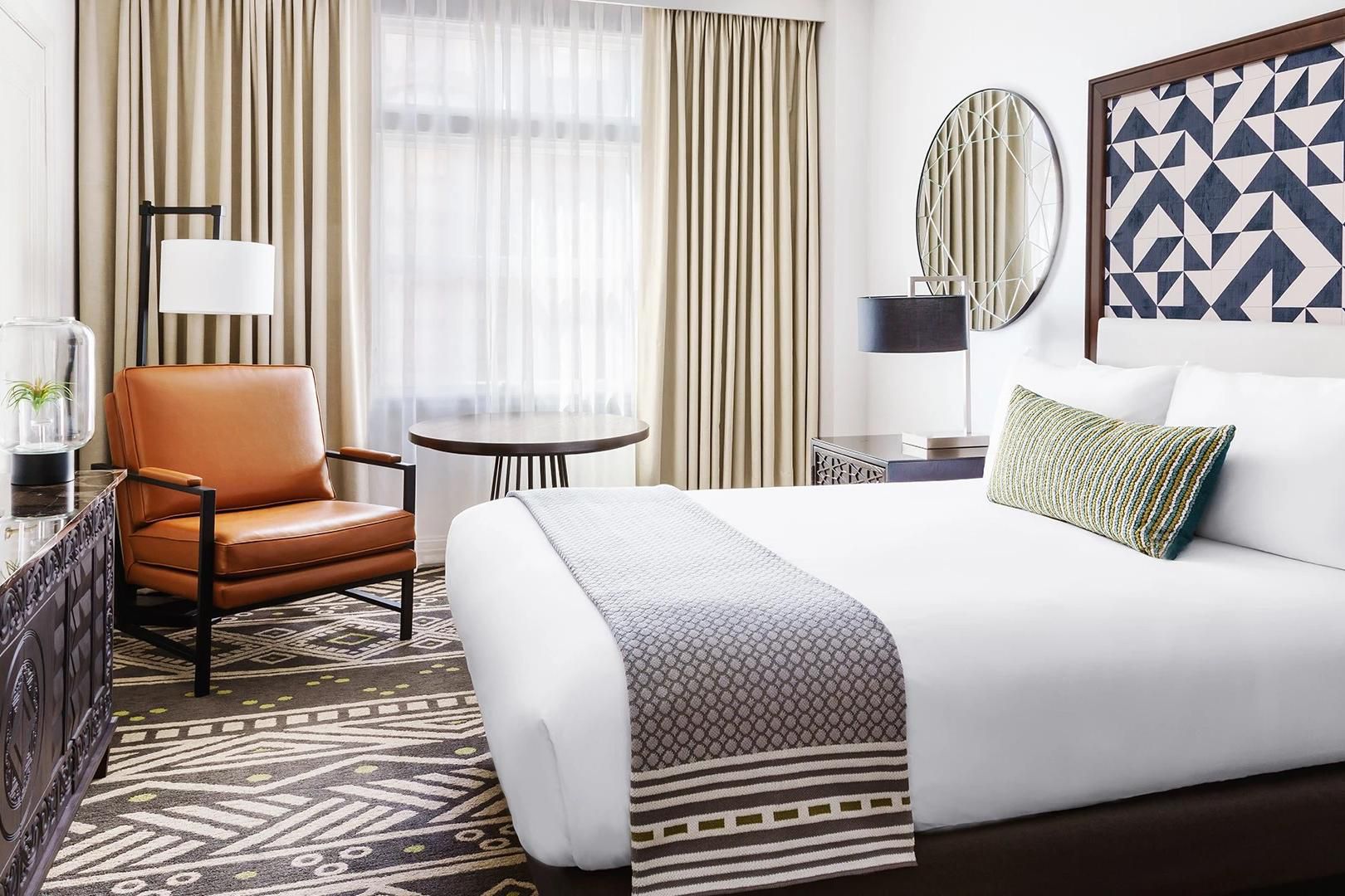 Relax in our king bedroom accommodations at Hotel Spero
