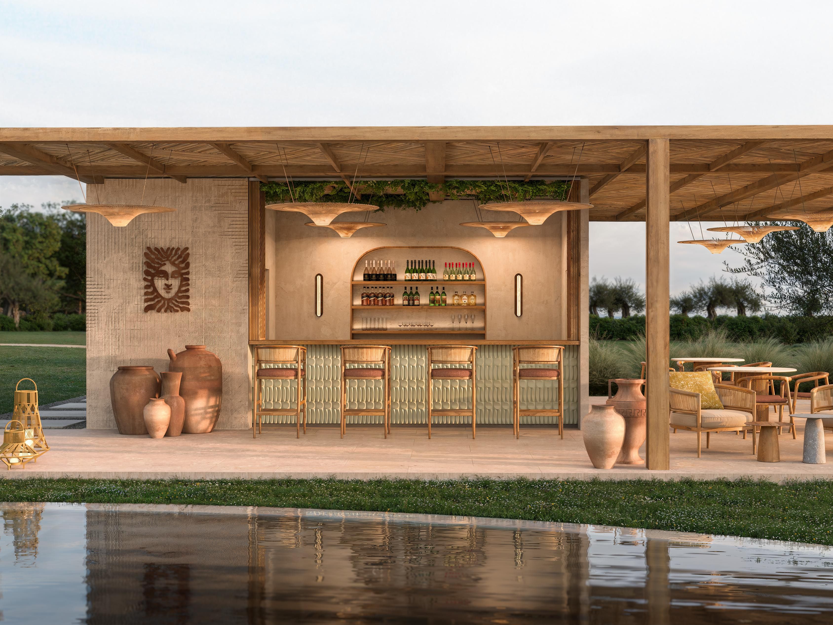 Poolside bar with pergola, warm lighting and garden views