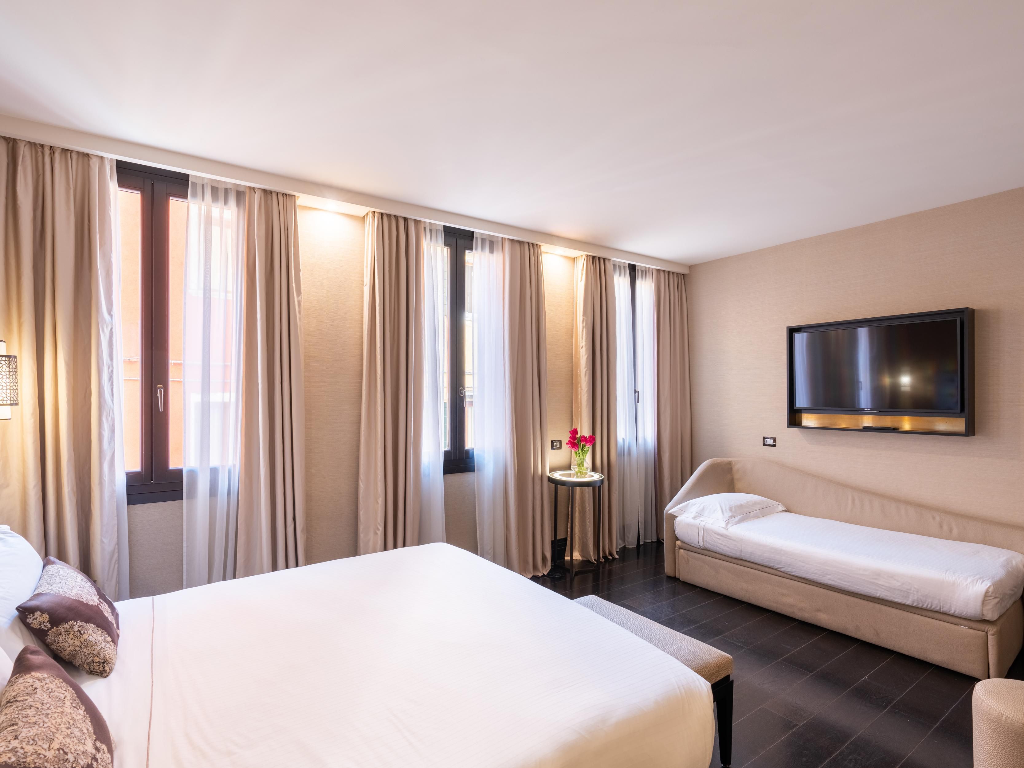 One King Standard room with two single sofas for comfort