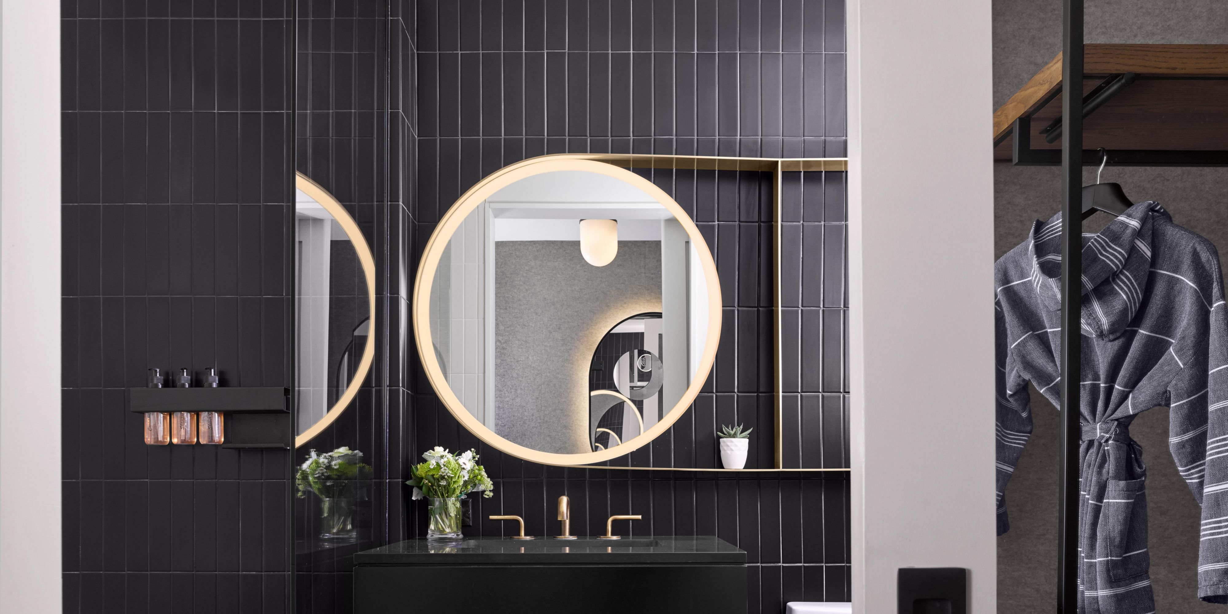 Guest bathroom feature modern design and high-end amenities.