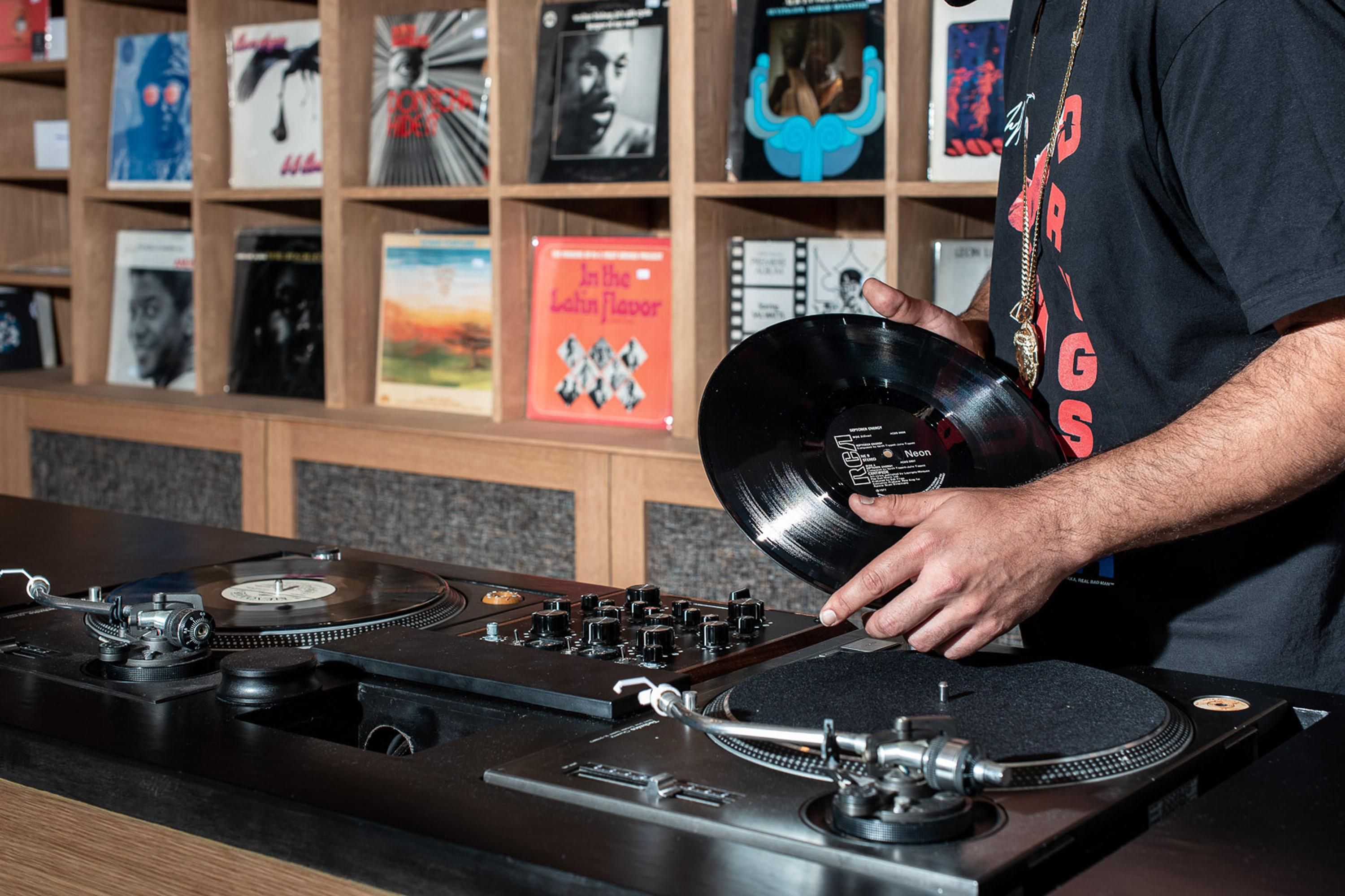 person holding vinyl record