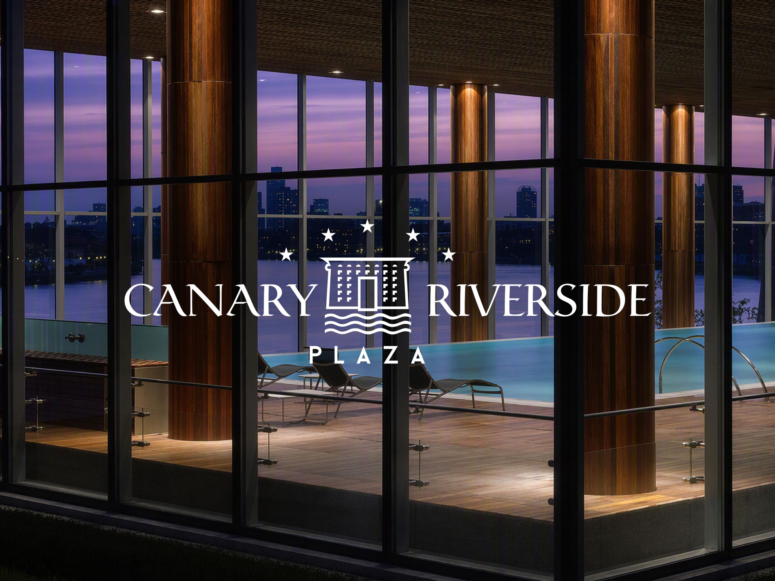 The indoor swimming pool at Canary Riverside Plaza, with stunning views of the Thames.
