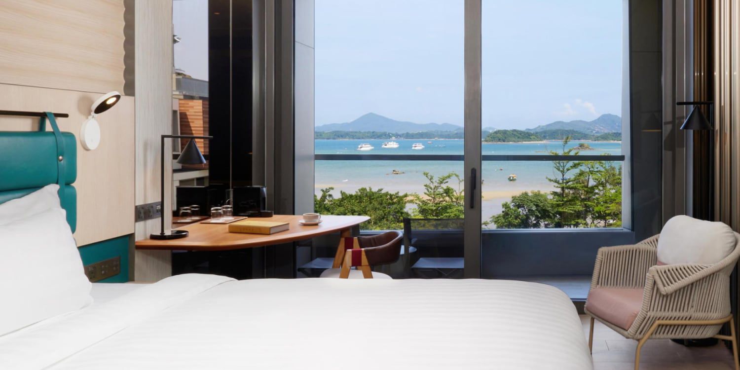 Coastal‑view room at Vignette Collection WM Hong Kong