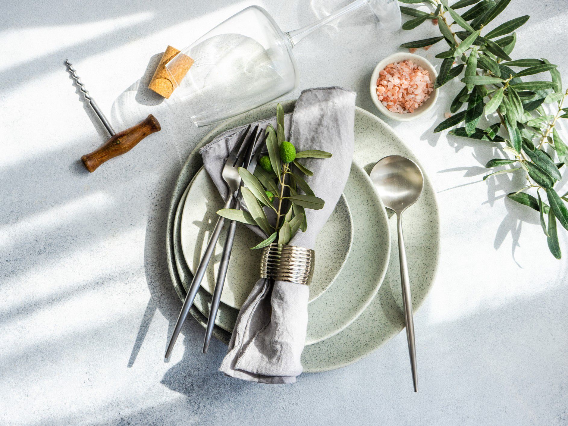 Table setting with olive branches