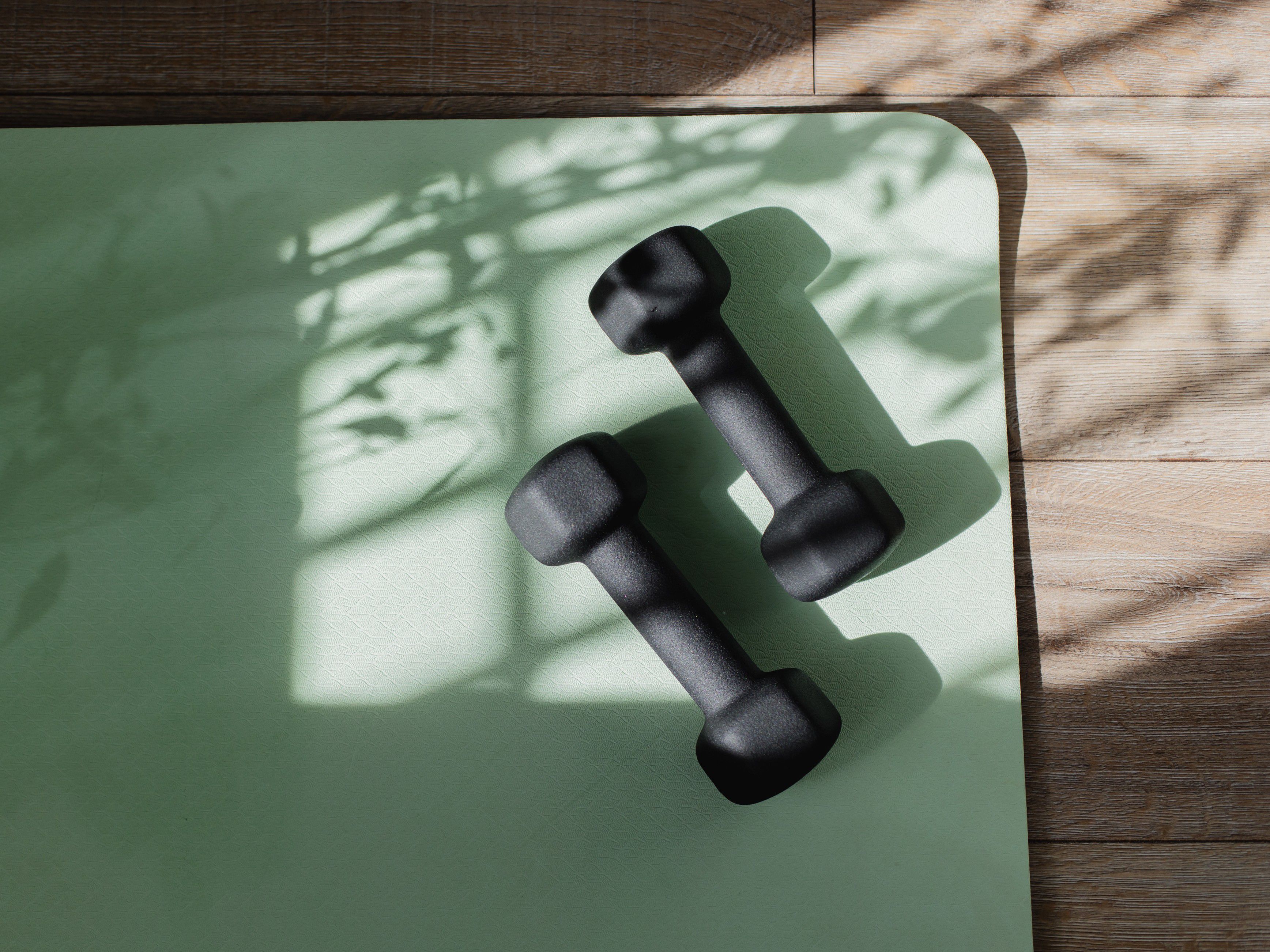 Yoga mat with weights