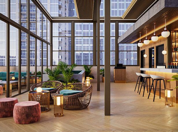 Contemporary hotel lounge with bar seating and city skyline views
