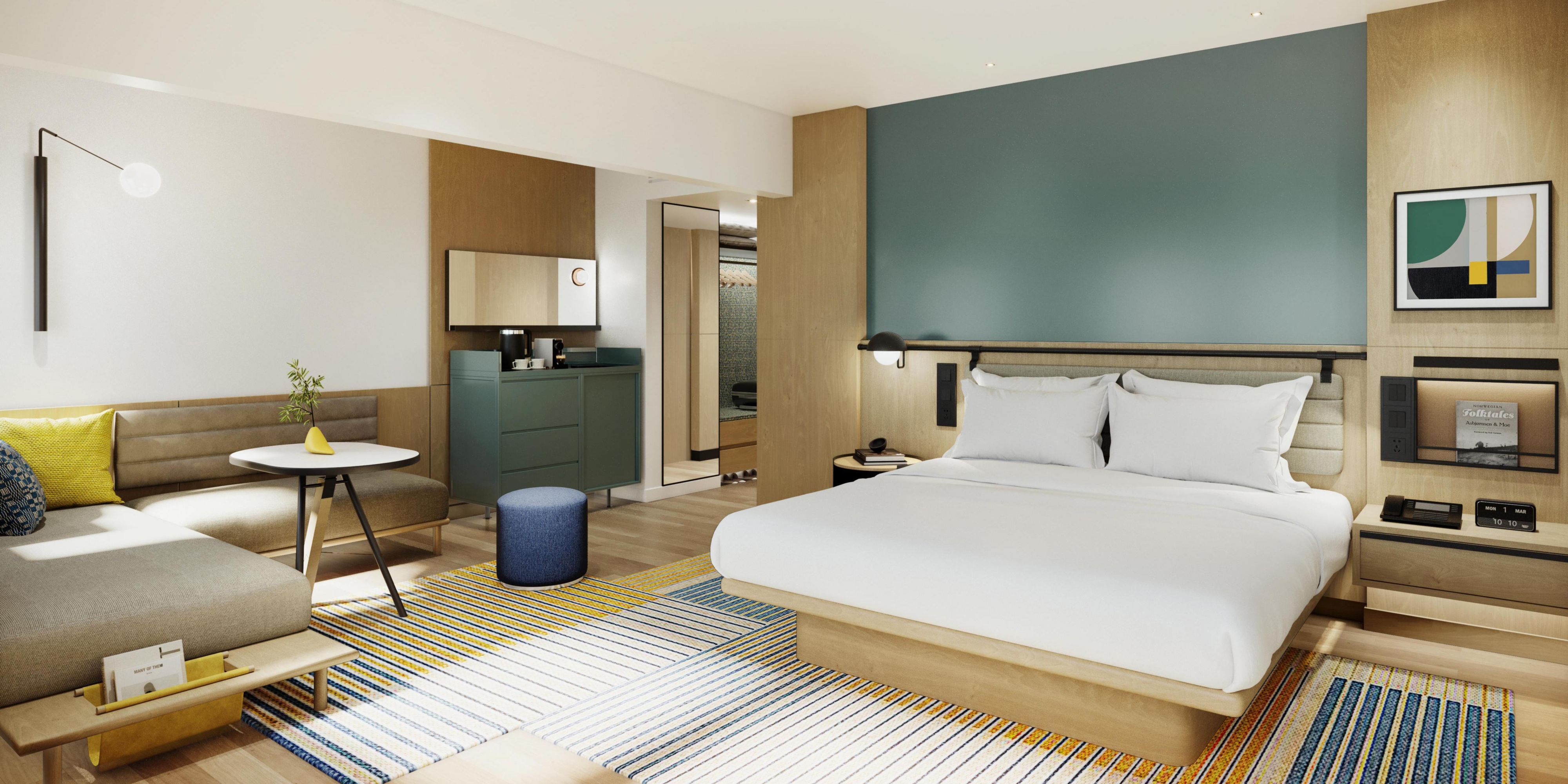 Experience the perfect blend of style, comfort, and functionality in our thoughtfully designed room—where warm wood tones meet bold, modern accents and city views set the scene for a memorable stay. Whether you're here to unwind or work, you'll love the layout. With plush bedding, curated artwork, and a vibe that’s both vibrant and relaxing.