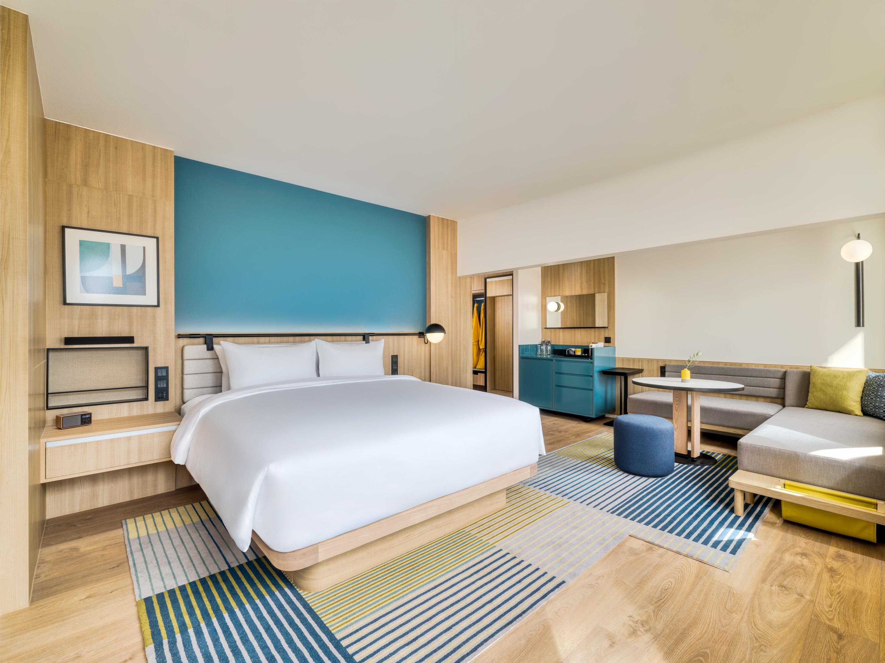 Relaxe em um espaçoso e confortável quarto King Grand