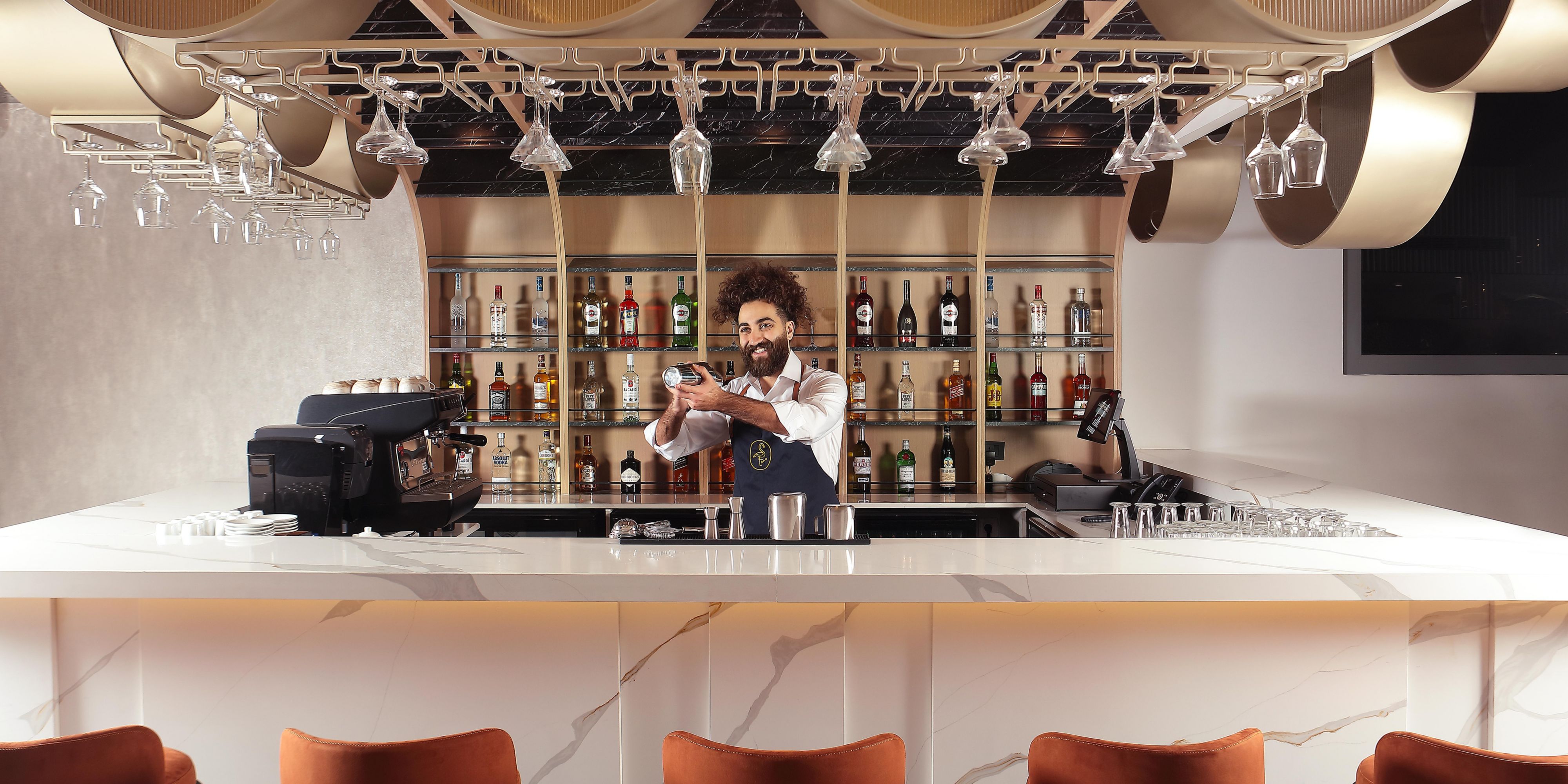 Unwind in our elegant lounge, where fine cigars, premium spirits, and signature cocktails set the tone. Whether you're winding down after a long day or meeting over drinks, Invita brings together comfort, style, and just the right touch of sophistication.
