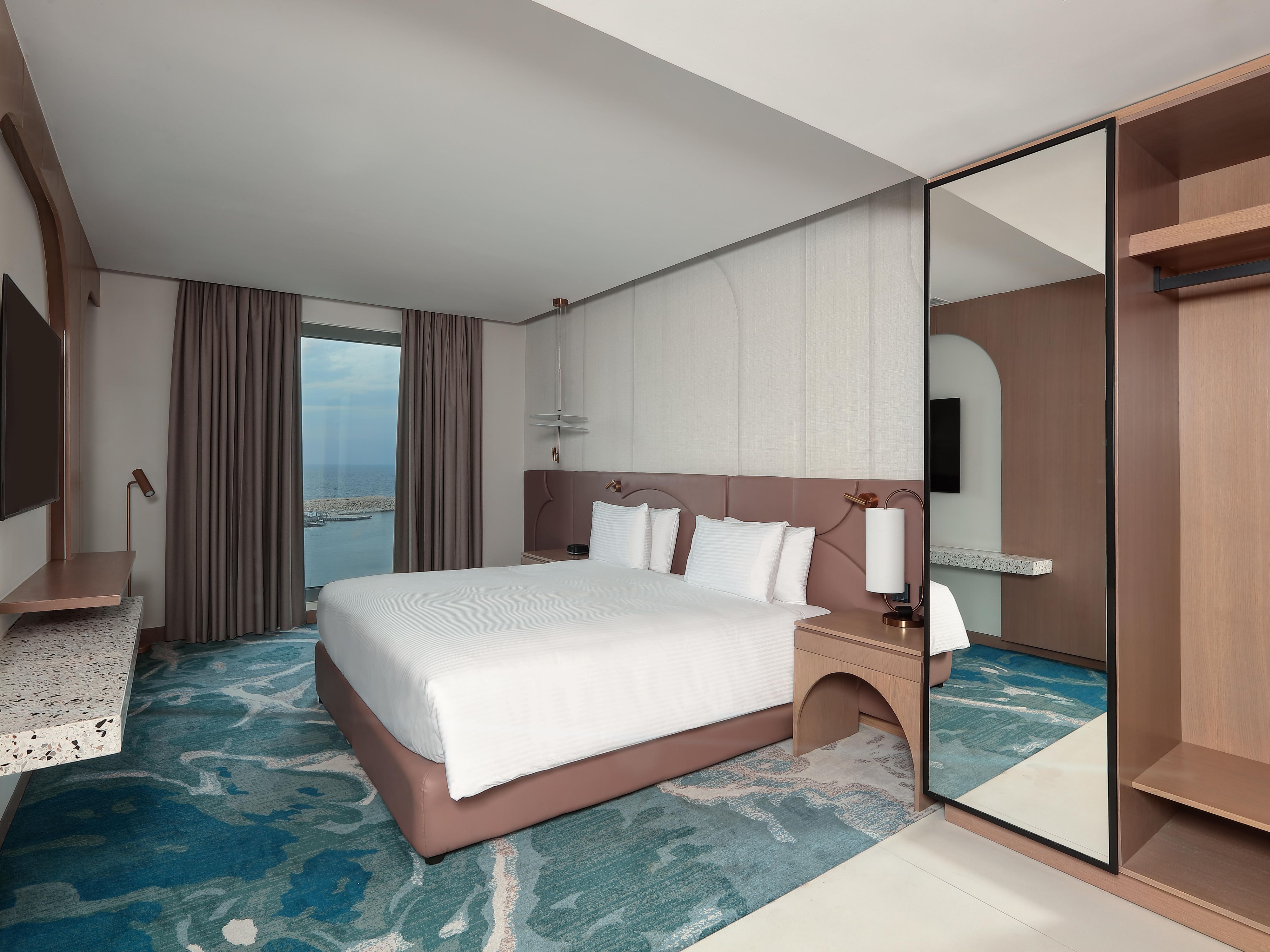 Enjoy premium amenities and stunning sea views in our Suite